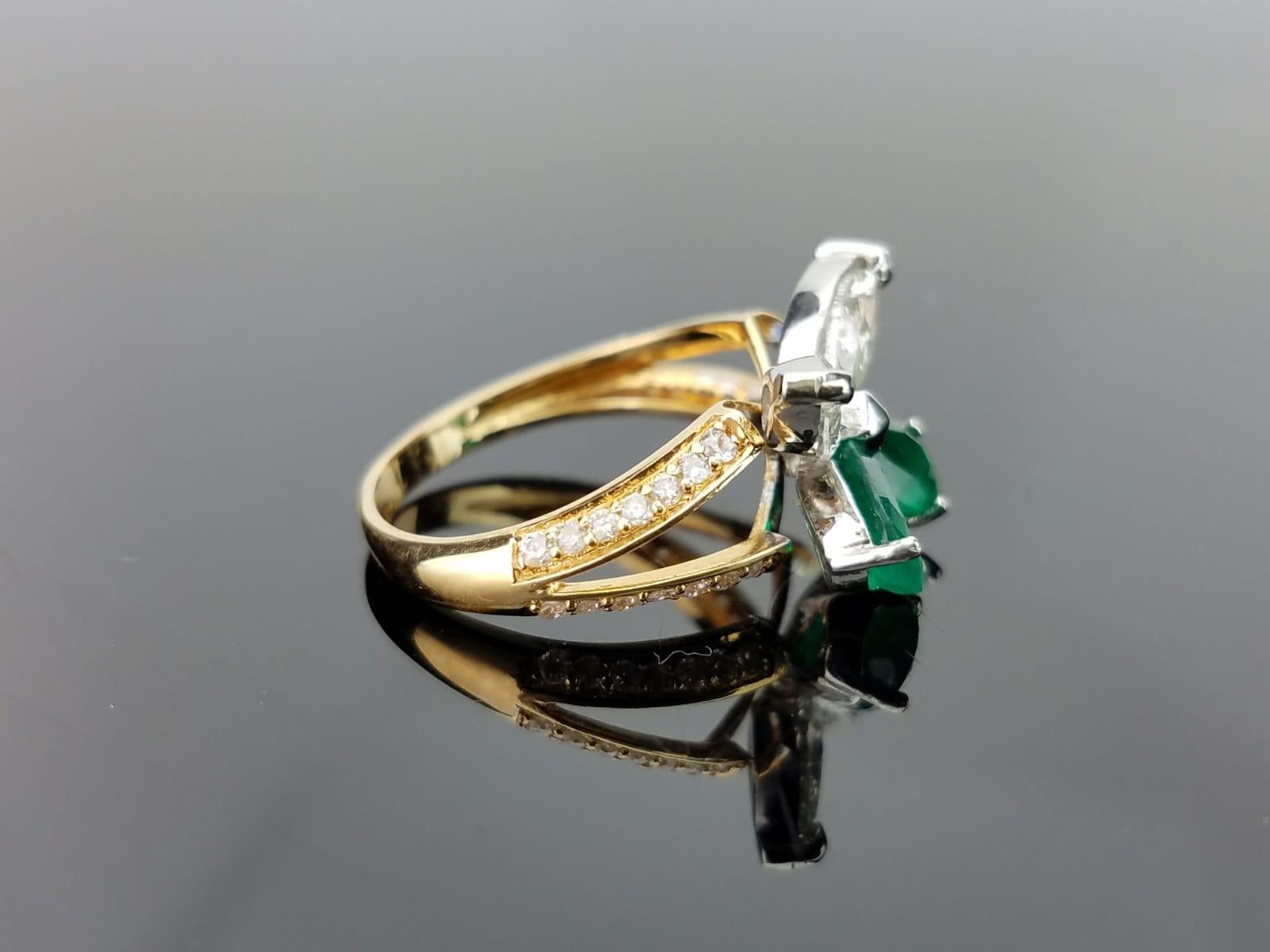 A delicate, and delightful ring with 2 Zambian Emerald marquise and 2 Diamond marquise - designed as a butterfly. All set in 18K yellow gold.

Stone Details: 
Stone: Zambian Emerald 
Carat Weight: 1.16 Carats

Diamond Details: 
Total Carat Weight: