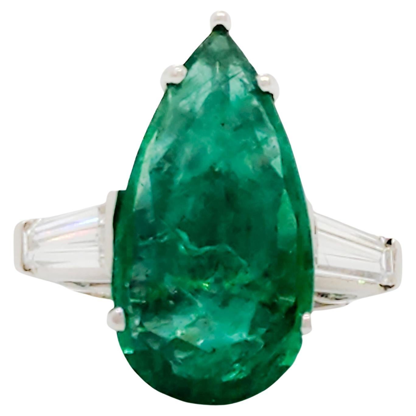 Emerald Pear Shape and White Diamond Three Stone Ring in 18k