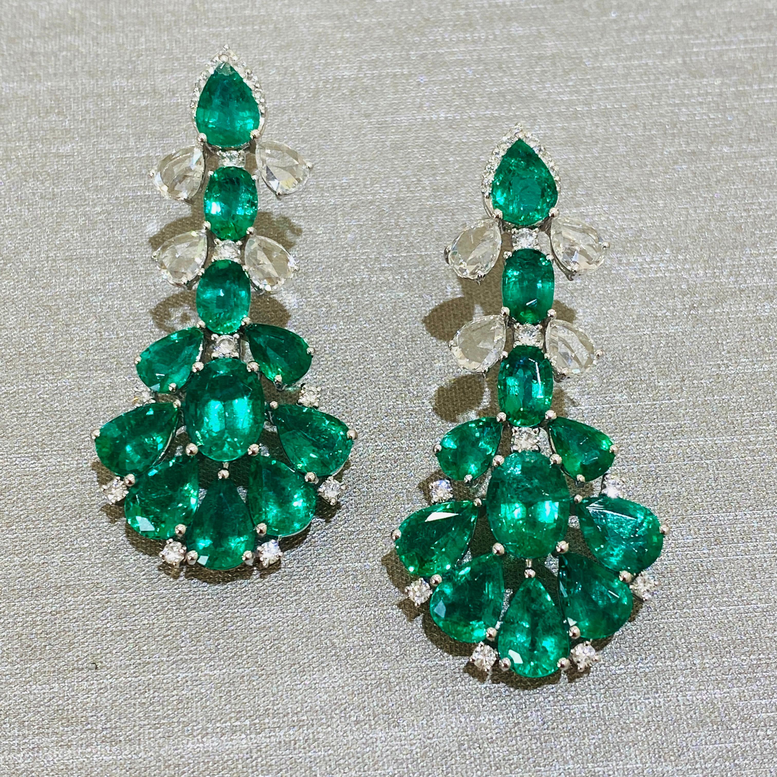 Contemporary Emerald Pear Shape & Oval and Diamond Earring in 18K White Gold For Sale