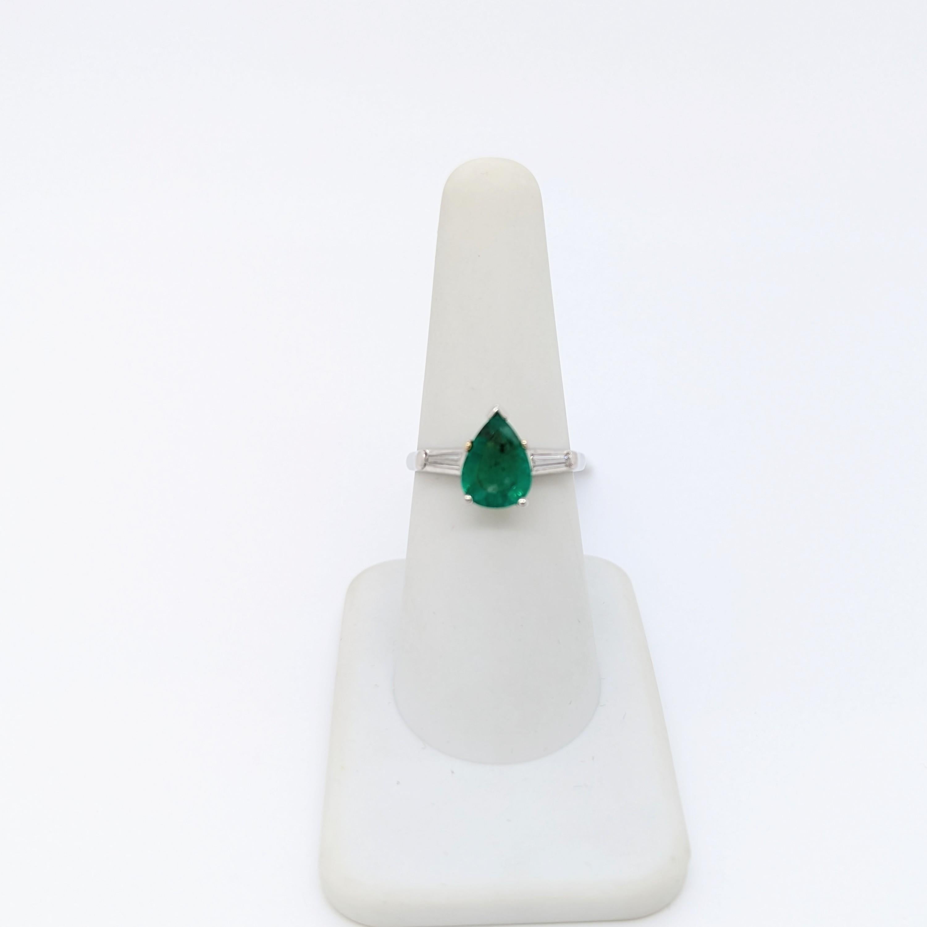 Pear Cut Emerald Pear Shape & White Diamond Baguette Three Stone Ring in Platinum For Sale
