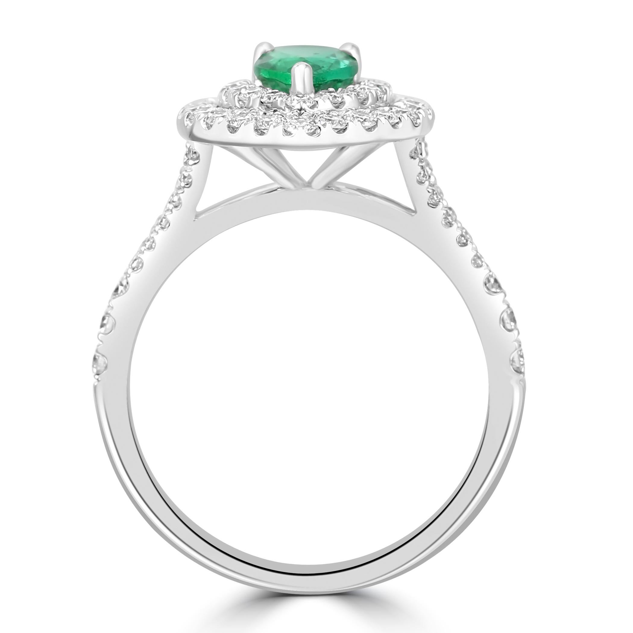 Bague de fiançailles émeraude poire et diamant blanc rond en or 18 carats en vente 1