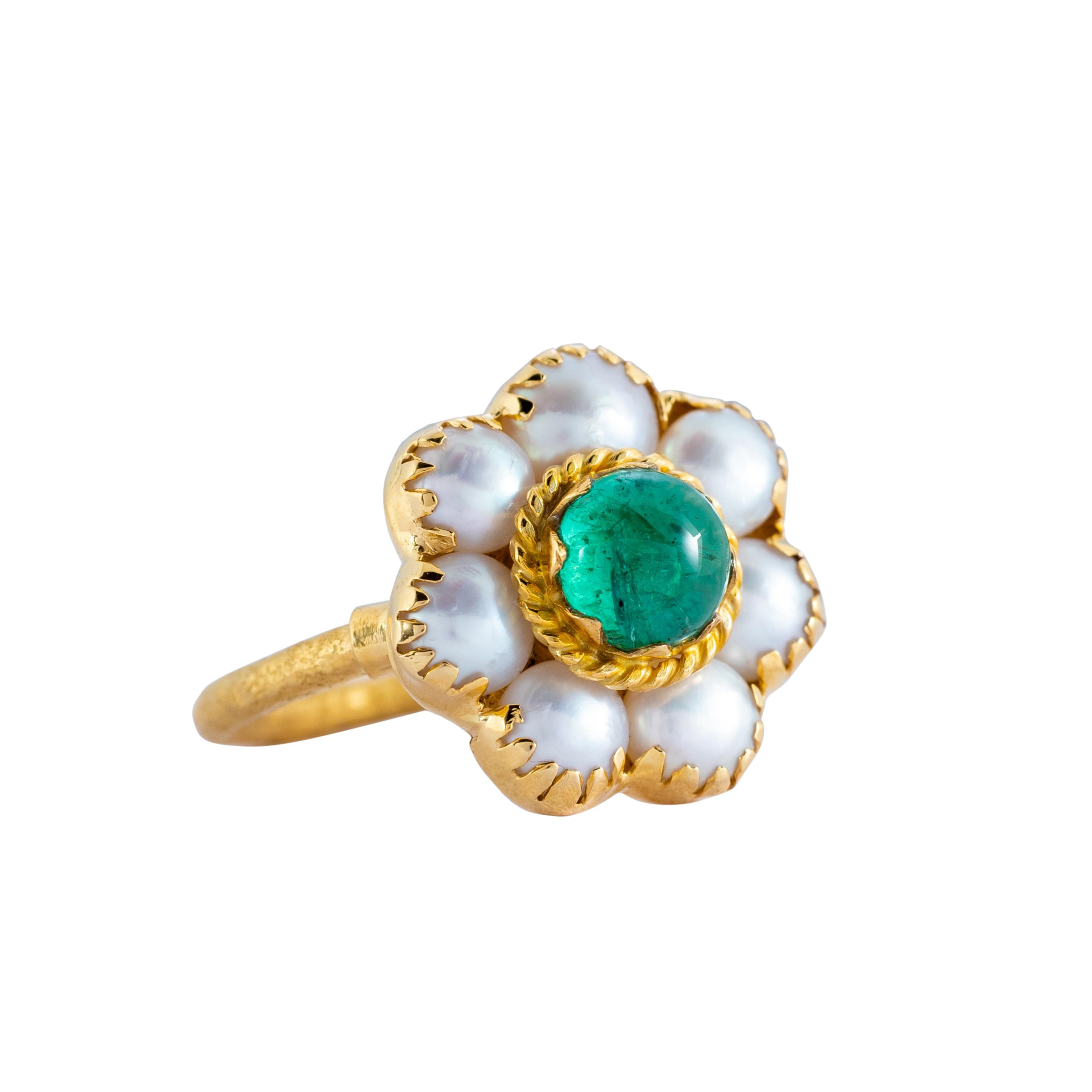 The exquisite Emerald Pearl 18k Gold Cluster Ring has been handmade in our workshops and is one-of-a-kind. It features a cabochon emerald in the centre which is flanked by pearls, and is set in 18k gold with detailed hand-engraving work.

Dimensions