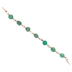 Pulsera de perlas y esmeraldas