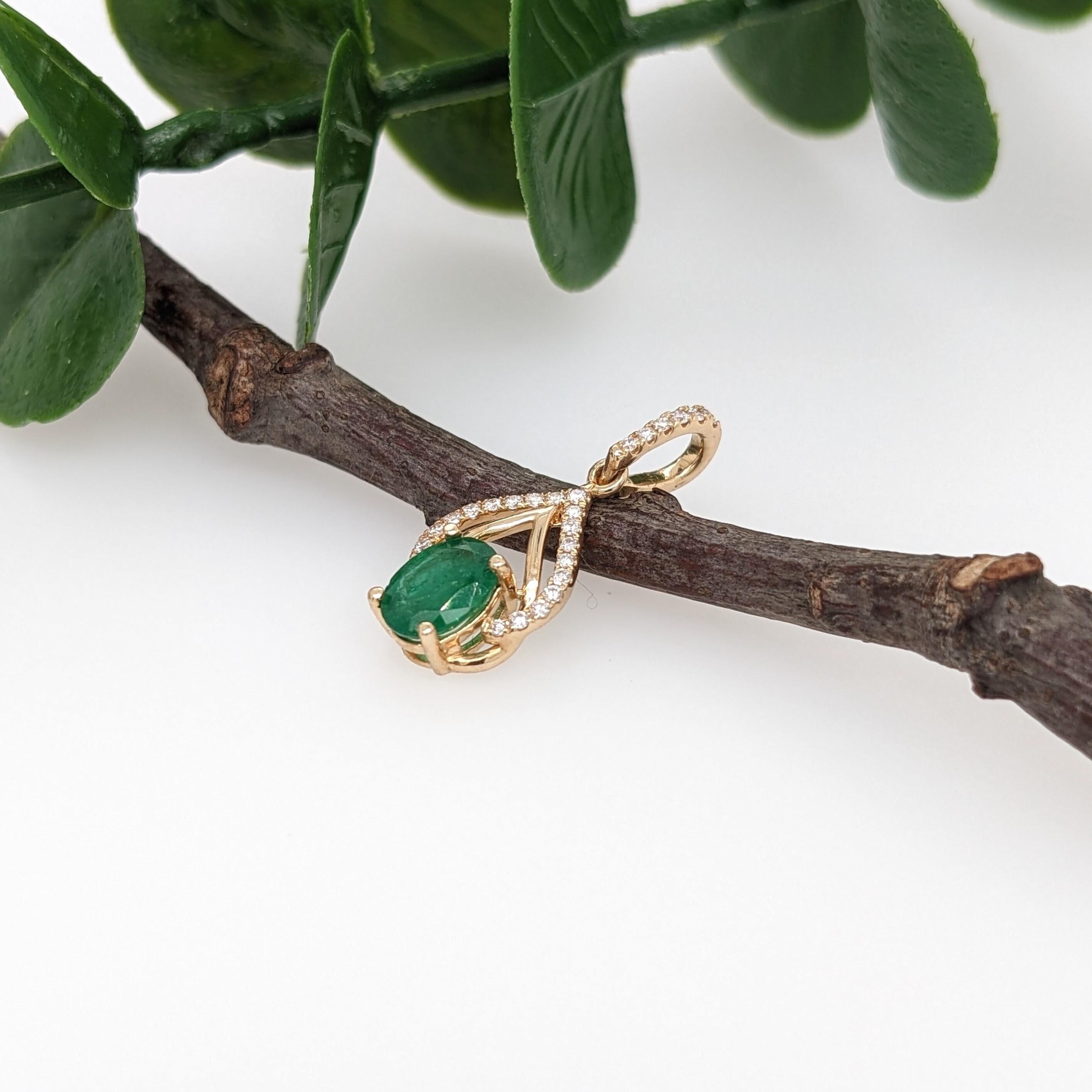 Add a flash of green with this cute and sparkly natural emerald pendant set in 14k solid yellow gold with natural diamond accents and a pave bail.  Available with a chain if you would like! :)

Specifications:

Item Type: Pendant
Center Stone: