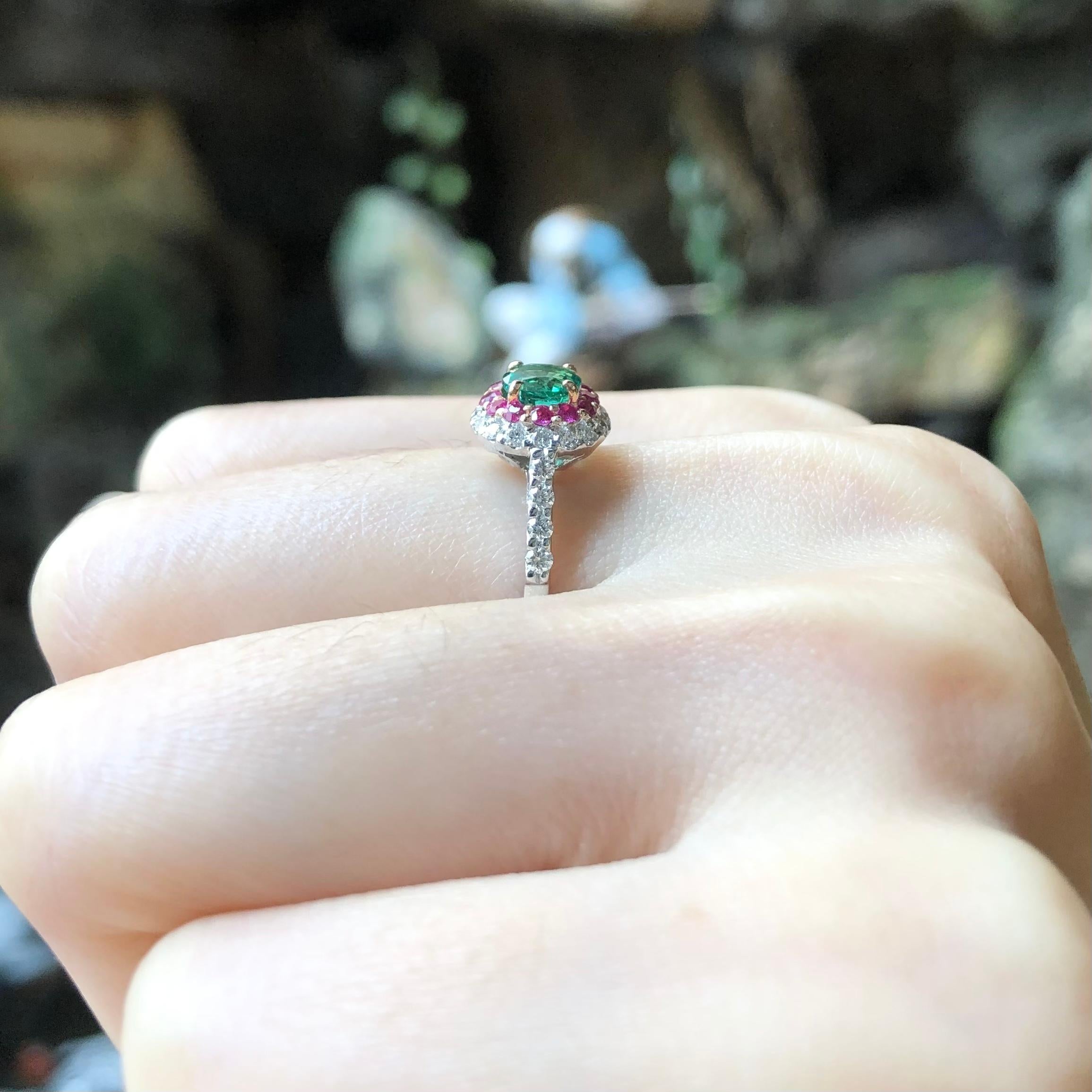 Contemporary Emerald, Pink Sapphire and Diamond Ring Set in 18 Karat White Gold Settings For Sale