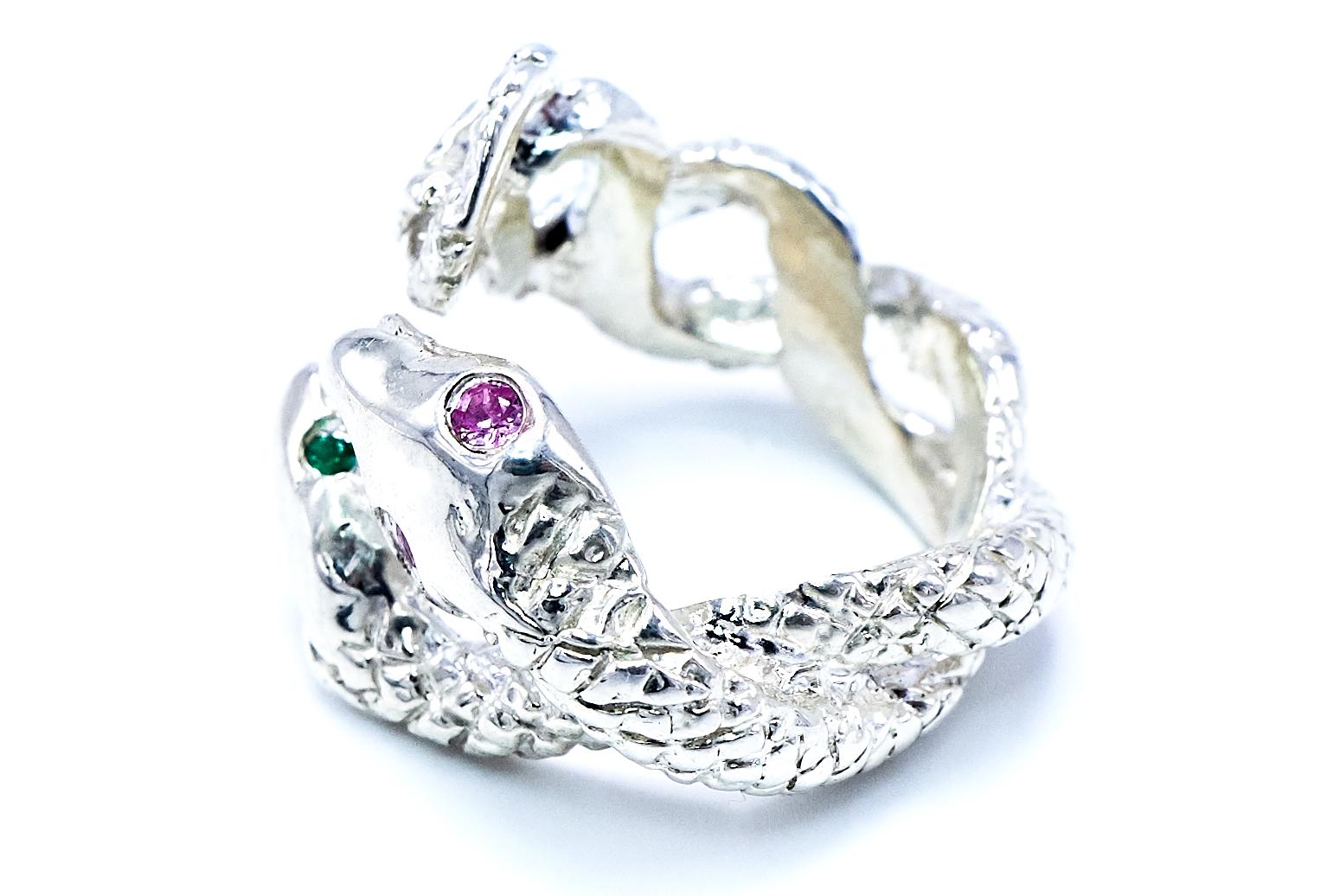 Material: Silver
Stones: Emerald and Pink Sapphire
Style: Snake Ring  Statement Cocktail Ring  Symbolic Jewelry
Production: Made to order – Completion in 3–4 weeks
Origin: Handcrafted in Los Angeles

This Emerald and Pink Sapphire Snake Ring is a