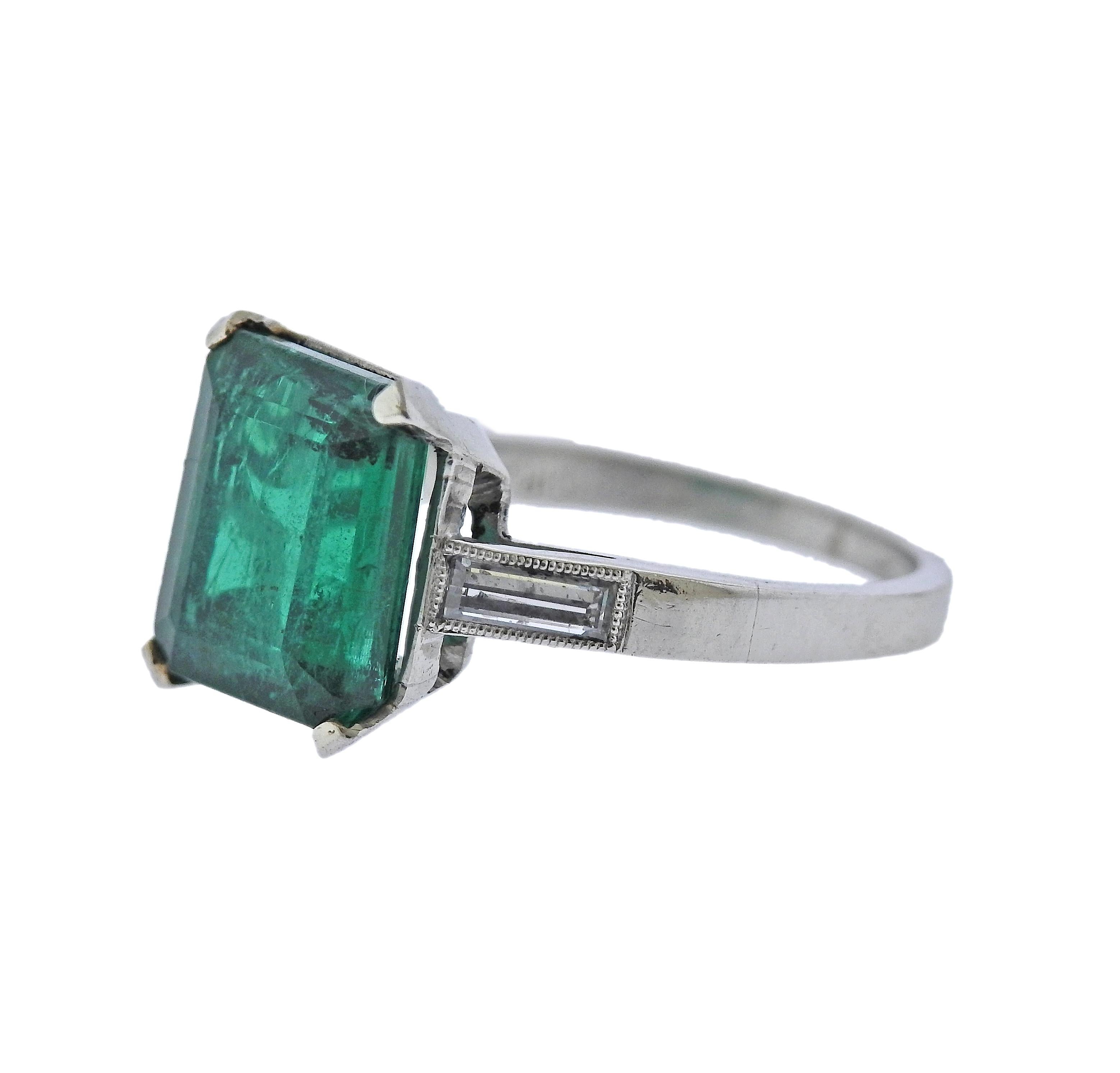 Platinum ring, with center approx. 2.53ct emerald ( stone measures 10 x 8.5 x 4.3mm), with two side tapered baguette diamonds. Ring size - 5.25. Marked Plat. Weight - 4.4 grams. 