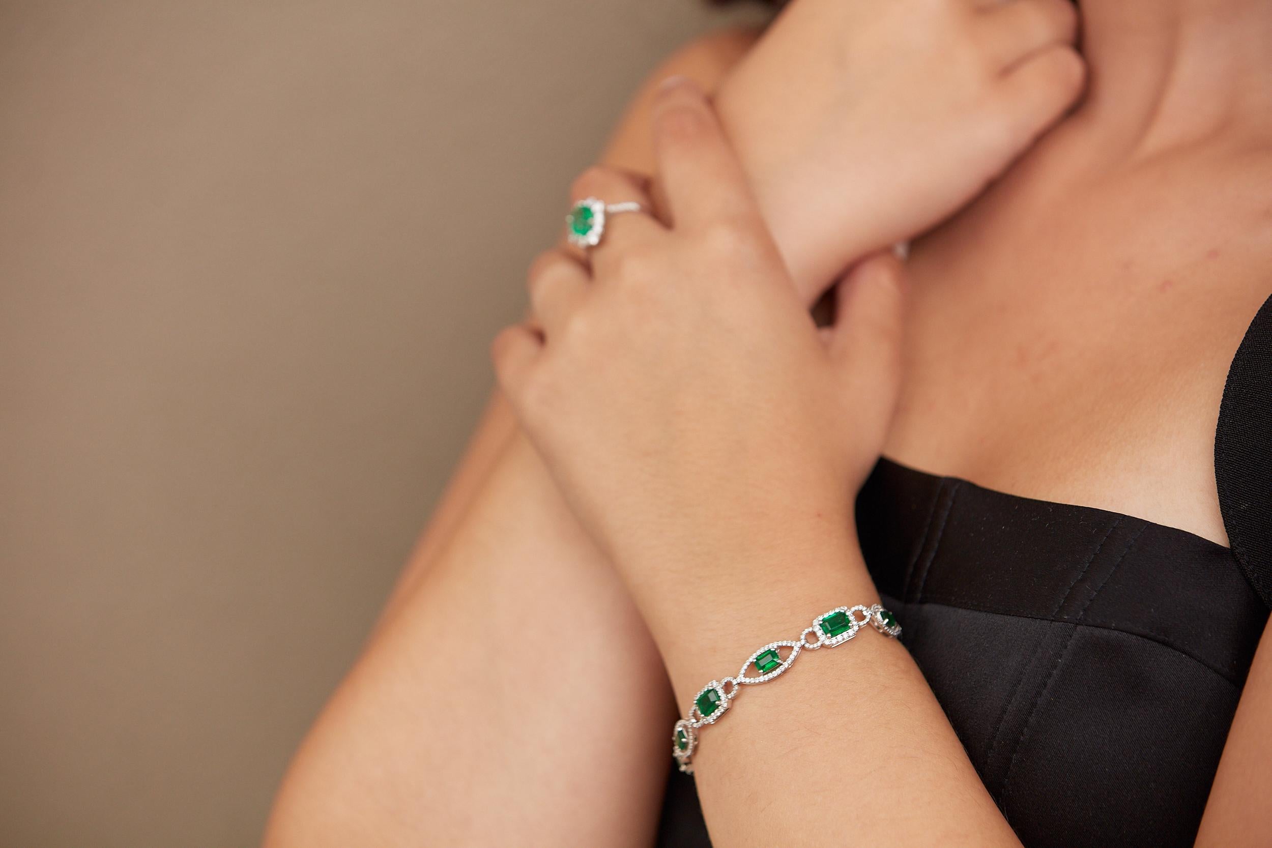 Tresor Diamond Bracelet features 1.96 cts diamond and 6.64 cts emerald in 18k white gold. The Bracelet are an ode to the luxurious yet classic beauty with sparkly diamonds. Their contemporary and modern design makes them versatile in their use. The