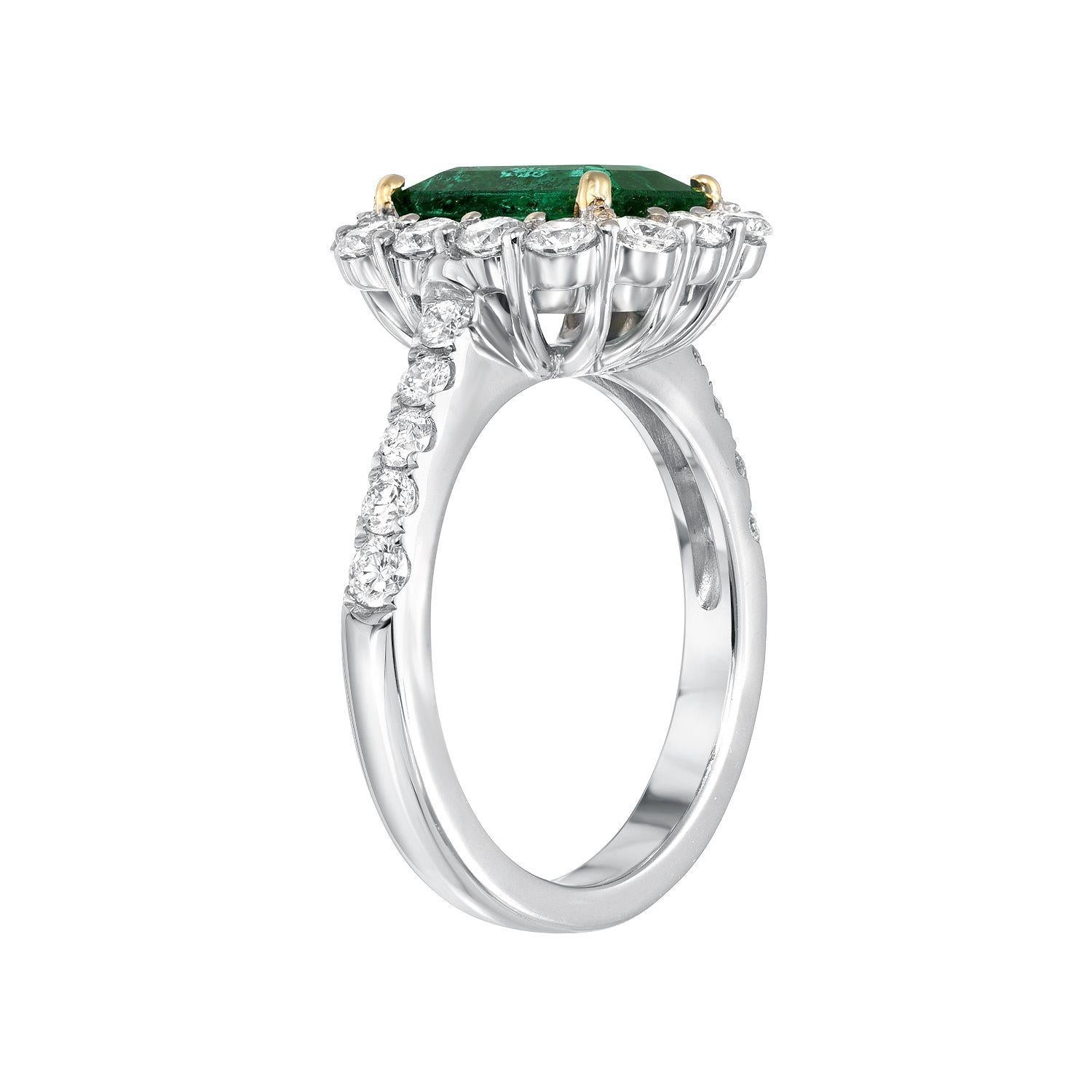 1.92 carat Emerald ring in 18K white and yellow gold, surrounded by round brilliant diamonds weighing a total of 1.07 carats.
Size 6.5. Re-sizing is complimentary upon request.
Returns are accepted and paid by us within 7 days of delivery.

Emerald