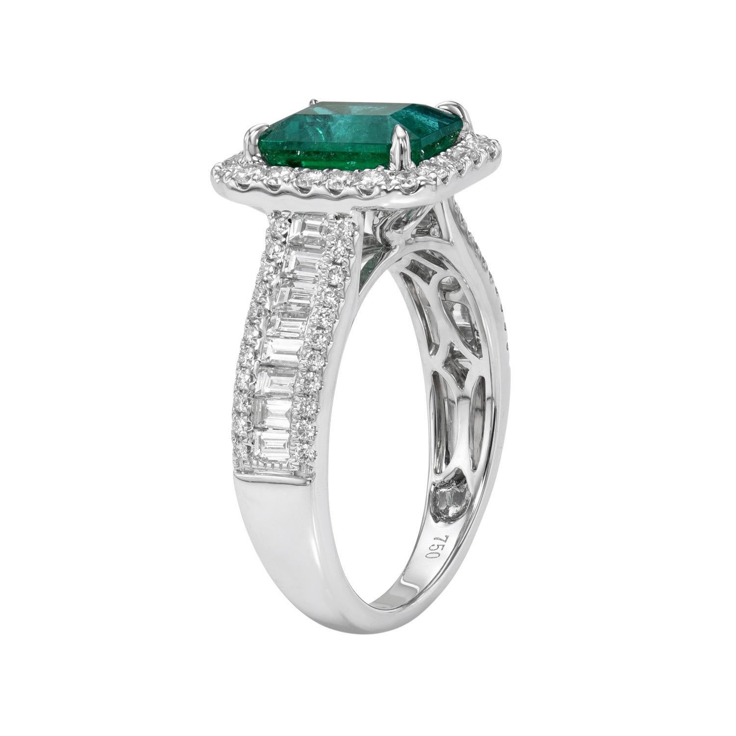 1.96 carat Emerald Cut Emerald, 18K white gold ring, decorated with round brilliant and baguette diamonds, F-G/VS, totaling 0.93 carats.
Ring size 6.5. Resizing is complementary upon request.
Returns are accepted and paid by us within 7 days of