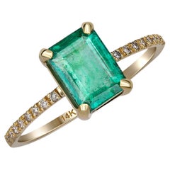 Vintage Emerald ring in 14 karat gold. Octagon emerald ring. May birthstone emerald ring