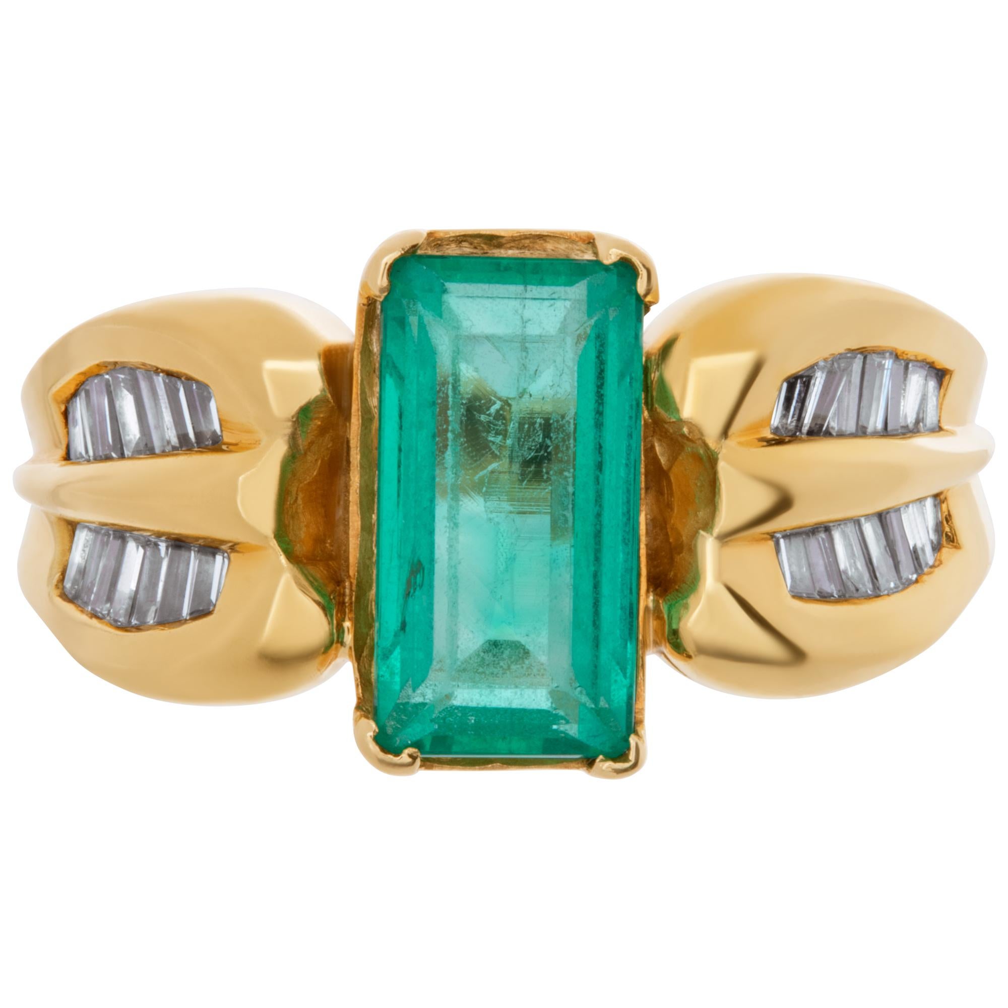 Rectangular cut emerald ring in 18k yellow gold with baguette cut diamond accents. Emerald is 2 carats and 0.60 baguette diamond total carat weight. Size 6.5This Emerald ring is currently size 7.25 and some items can be sized up or down, please ask!