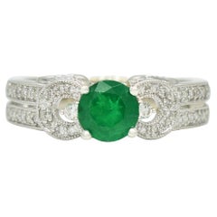 0.67 Carats Natural Colombian Emerald and Diamonds Fashion Ring in White Gold