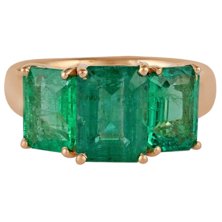 Emerald Ring Studded in 18 Karat Yellow Gold For Sale