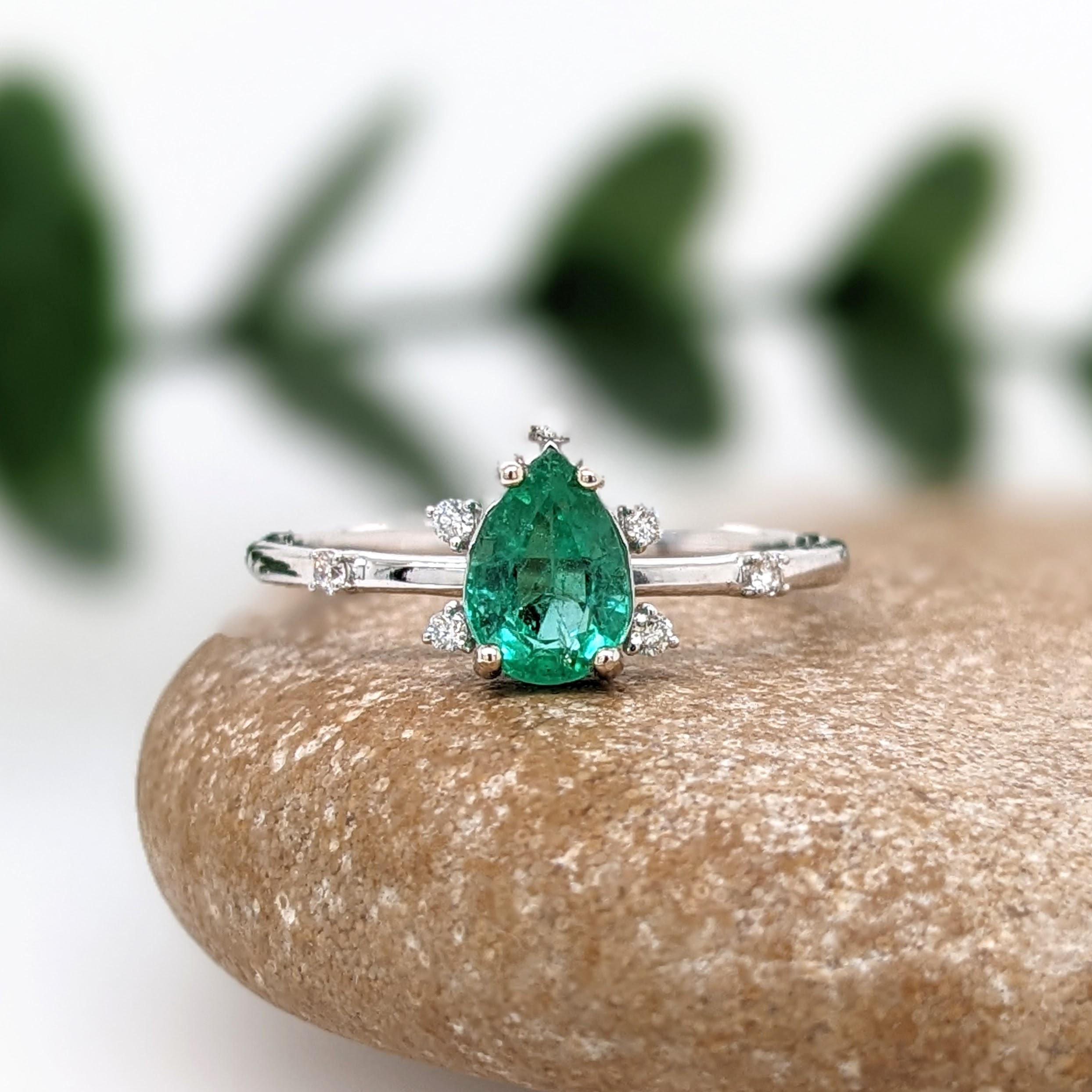 This ring features a cute pear shape 7x5mm emerald with natural diamond accents in a 14k white gold ring setting. This ring makes a beautiful may birthstone ring for your loved ones.

Specifications

Item Type: Ring
Centre Stone: Emerald
Treatment:
