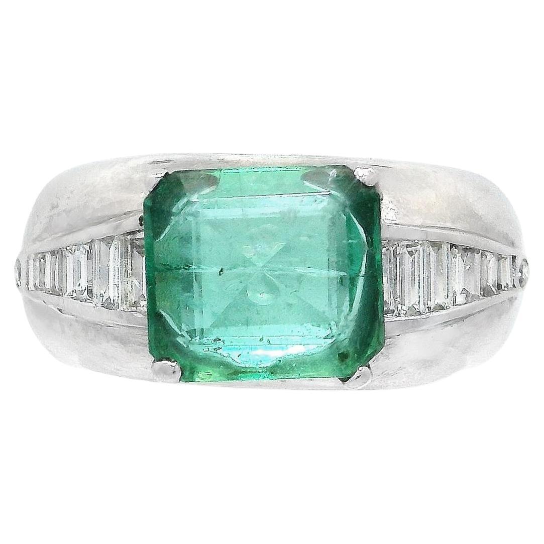 Emerald Ring with Baguette and Round Diamond in 18K White Gold