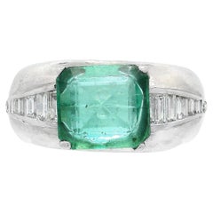 Emerald Ring with Baguette and Round Diamond in 18K White Gold