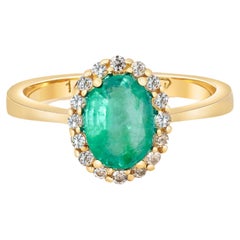 Emerald 14k gold ring .