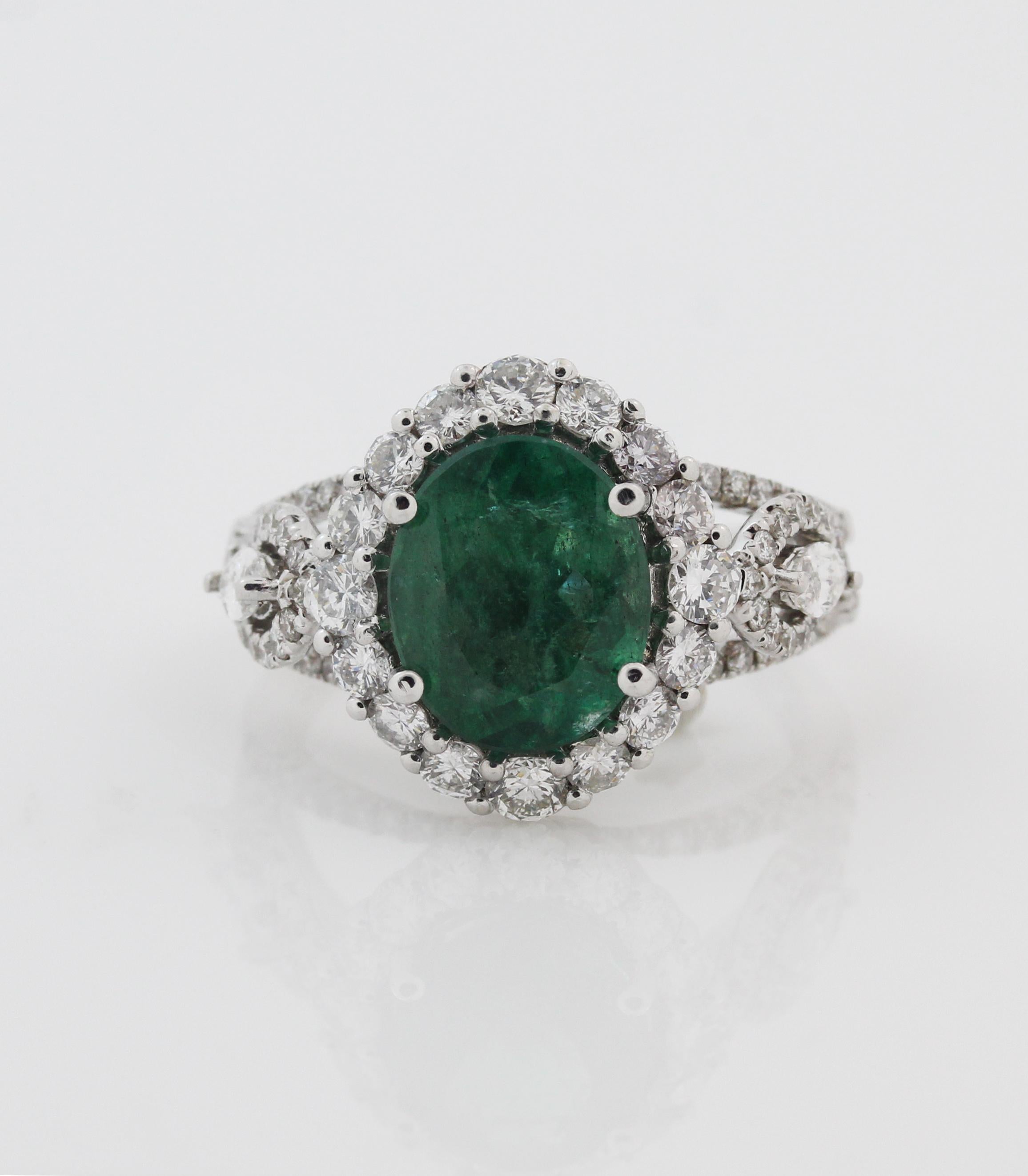 14K White Gold and Diamond Ring with Oval Emerald center

Center Emerald is oval, from Zambia, apprx. 3.20 carat, 10mm x 8mm 

Ring has 1.44 carat diamonds

Size 6. Sizable