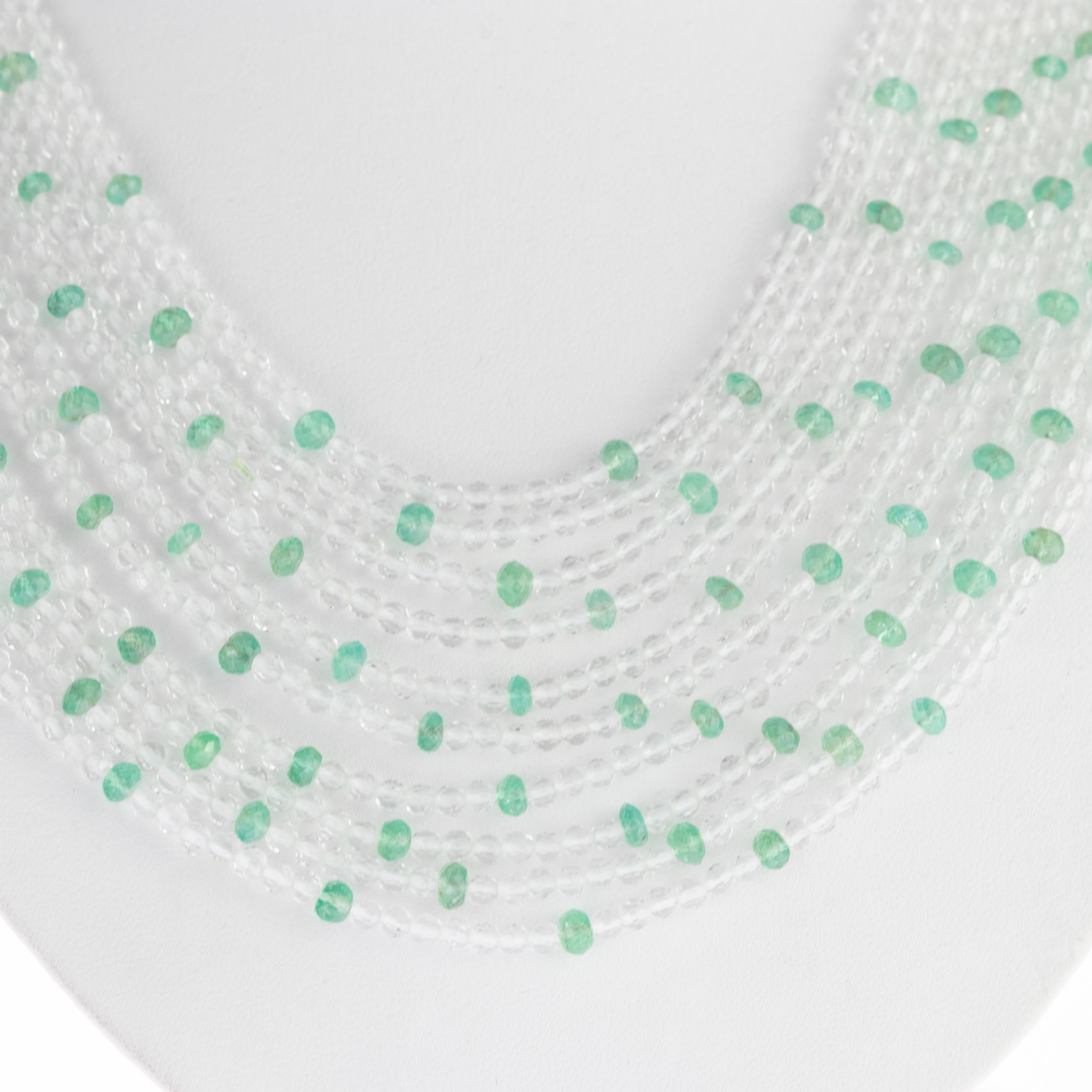 Timeless necklace wrapped in emeralds and rock crystal that create an elegant look. Handmade multi strand design between green rondelles and round transparent precious stones.

Wearing emeralds in combination with other stones will enhance outcomes