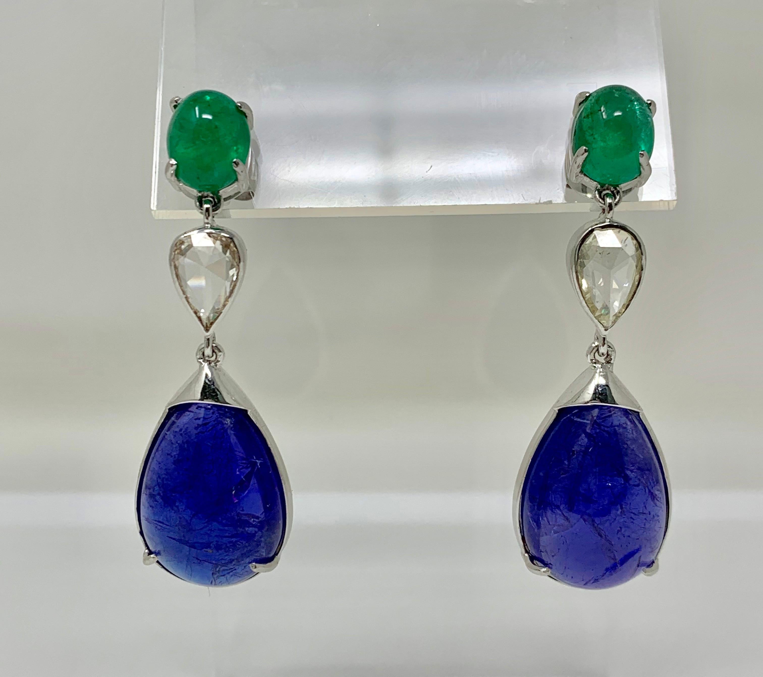 Moguldiam Inc Emerald , Rose cut diamond and Tanzanite earrings are custom hand made in 18 K white gold. 
Emerald weight : 6.55 carat 
Rose cut diamond weight : 2.58 carat 
Tanzanite weight : 16.52 carat 

