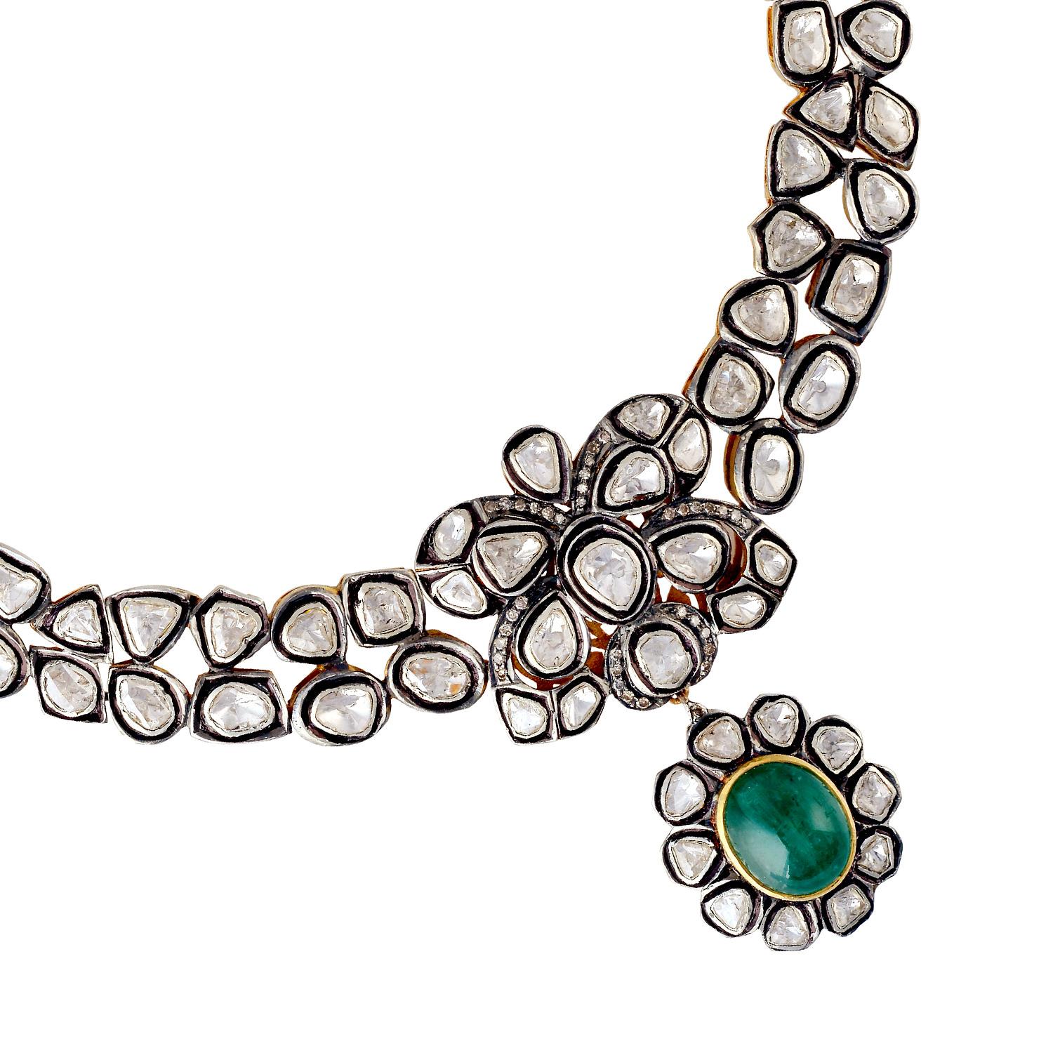 The Maharaja collection inspired by the Moghul Era & Indian heritage. A stunning antique style necklace is handmade in 14K gold and sterling silver. It is set in 7.58 carats emeralds & 13.39 carats of rose cut diamonds in blackened finish. Clasp