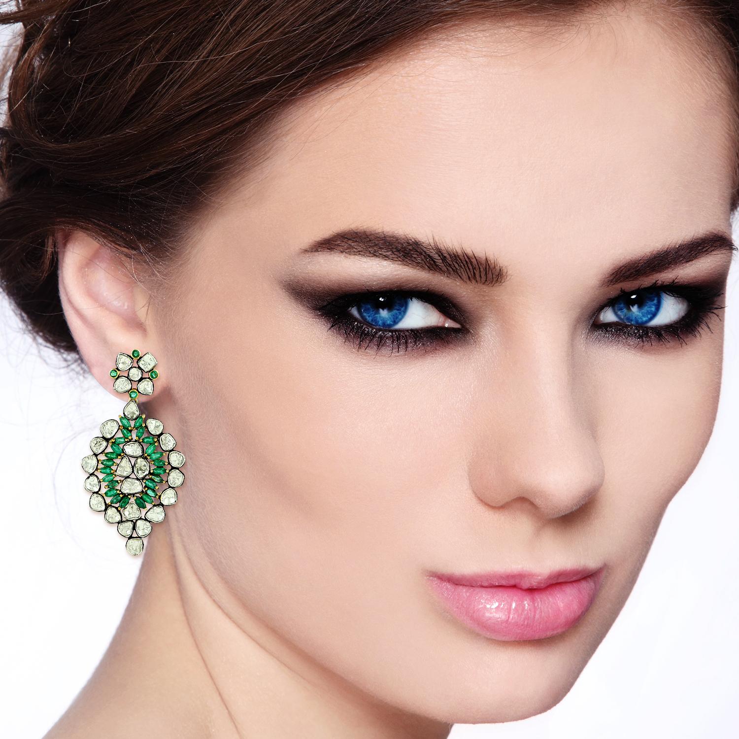 These stunning earrings are handcrafted in 18-karat gold & sterling silver.  It is hand set with 5.19 carats emeralds and 9.89 carats of rose cut diamonds with blackened finish.

FOLLOW  MEGHNA JEWELS storefront to view the latest collection &