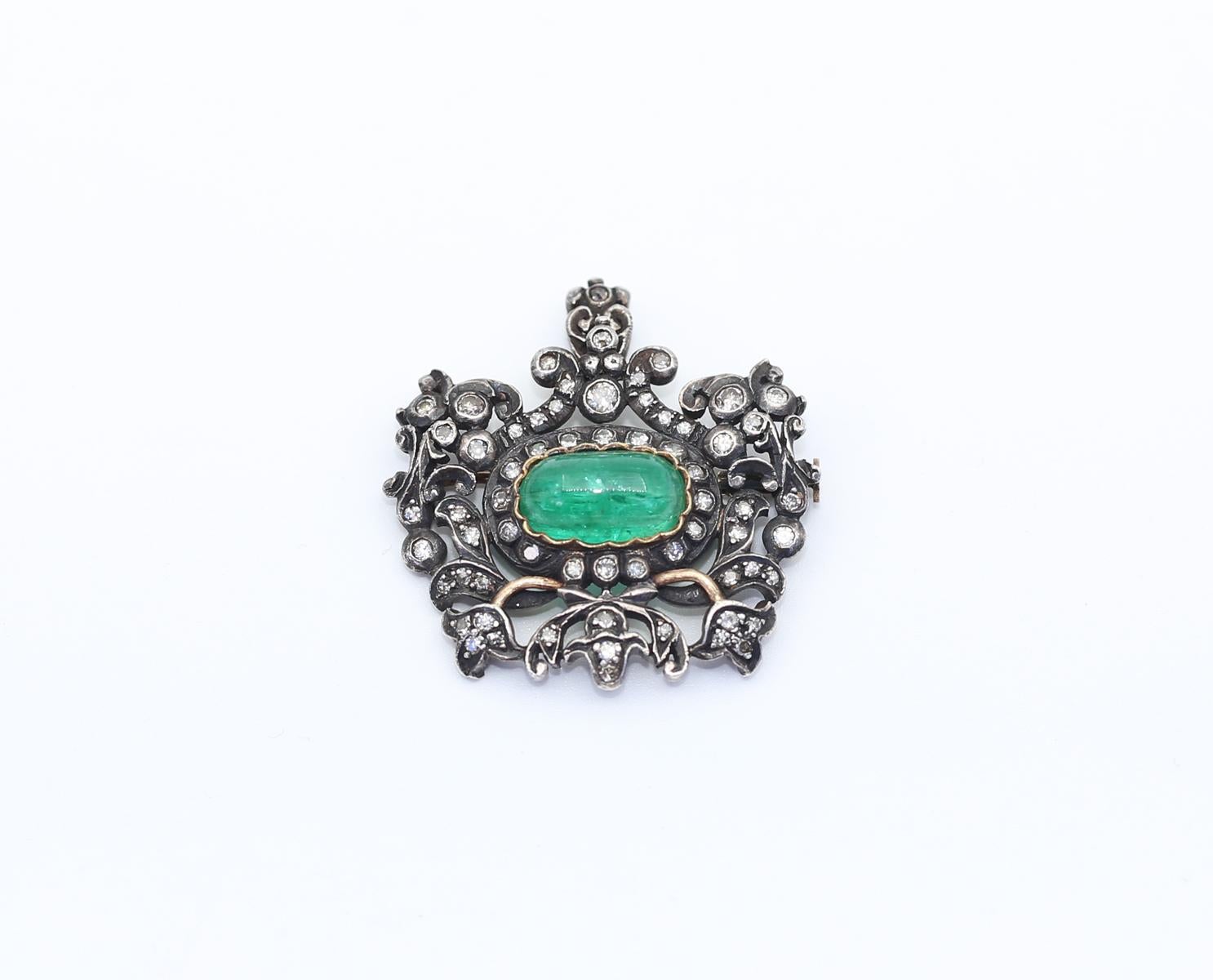 Emerald Rose-cut Diamonds Brooch Pin Pendant Silver Gold. Created around 1890.
Finely detailed High-Quality Antique Diamond Gold and Silver Brooch that is also a pendant. There is a loop on top that is big enough to accommodate a chain or a lace.
