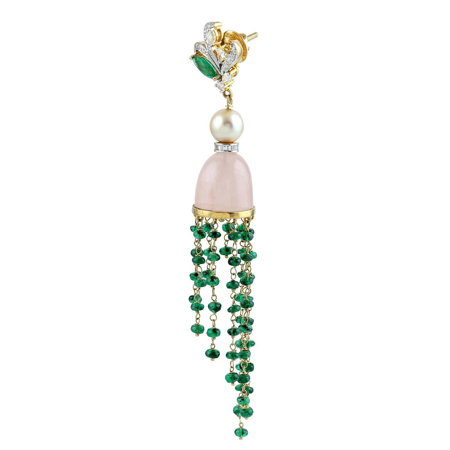 Cast in 18 karat gold, these stunning earrings are hand set with 12.27 carats emerald beads, 2.95 carats pearl, rose quartz and 1.01 carats of glimmering diamonds. 

FOLLOW MEGHNA JEWELS storefront to view the latest collection & exclusive pieces.