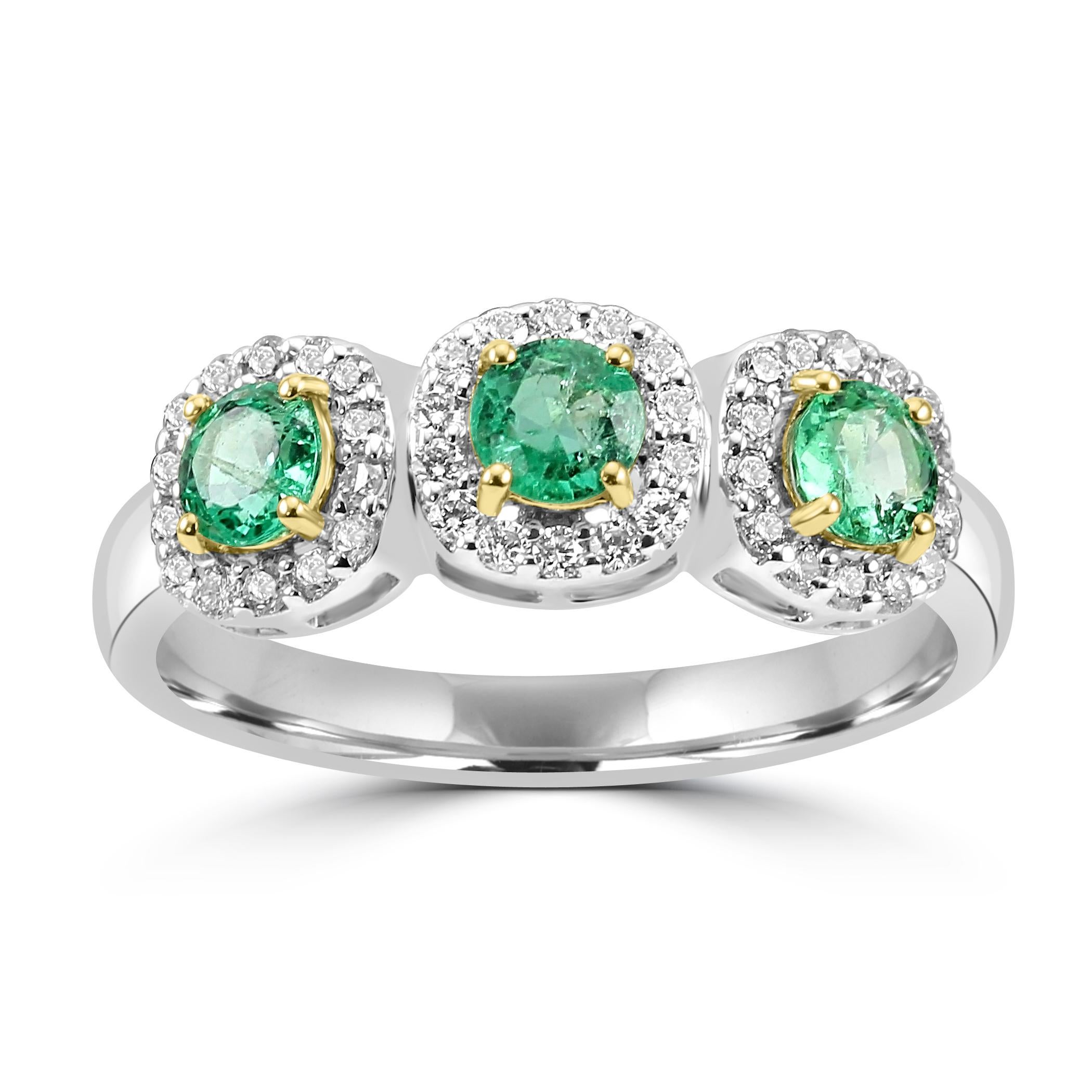 Behold our breathtaking 3-Stone engagement fashion ring, a symbol of everlasting love and timeless elegance.

This beautiful ring features three captivating Emerald Rounds, totaling to 0.52 carats, set in luxurious 18K White Gold. The nature-like