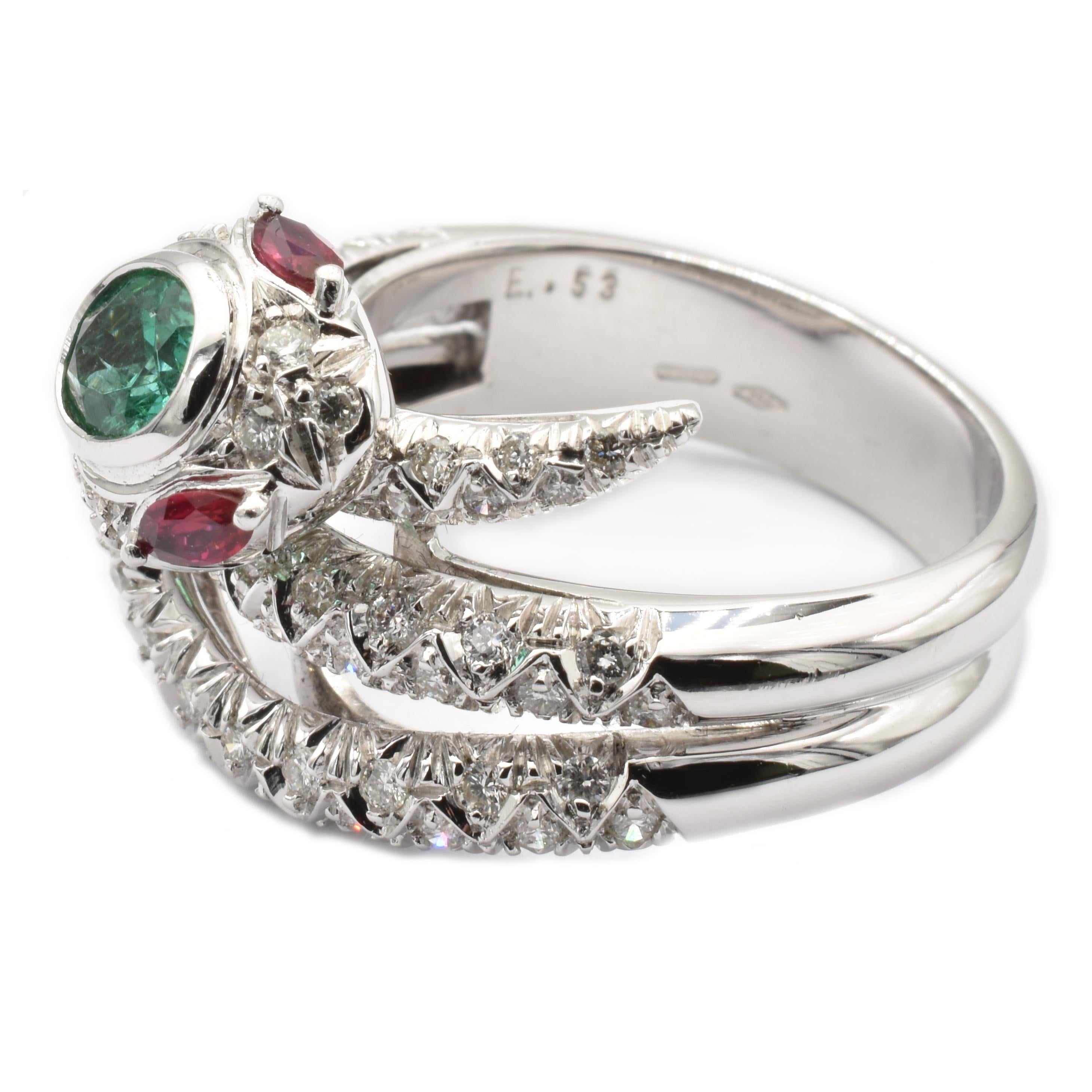 Gilberto Cassola 18Kt White Gold Snake Ring with a Oval Emerald, two Marquise Rubies and Diamonds.
Handmade in our Atelier in Valenza Italy.
Bright Green Natural Emerald Oval sized mm 6.00 X 4.50.  Weight ct 0.53
Intense Red Natural Ruby Marquises