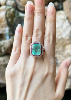 Emerald, Ruby and Diamond Ring set in 18K Rose Gold Settings