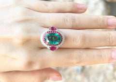 Emerald, Ruby and Diamond Ring set in 18K White Gold Settings