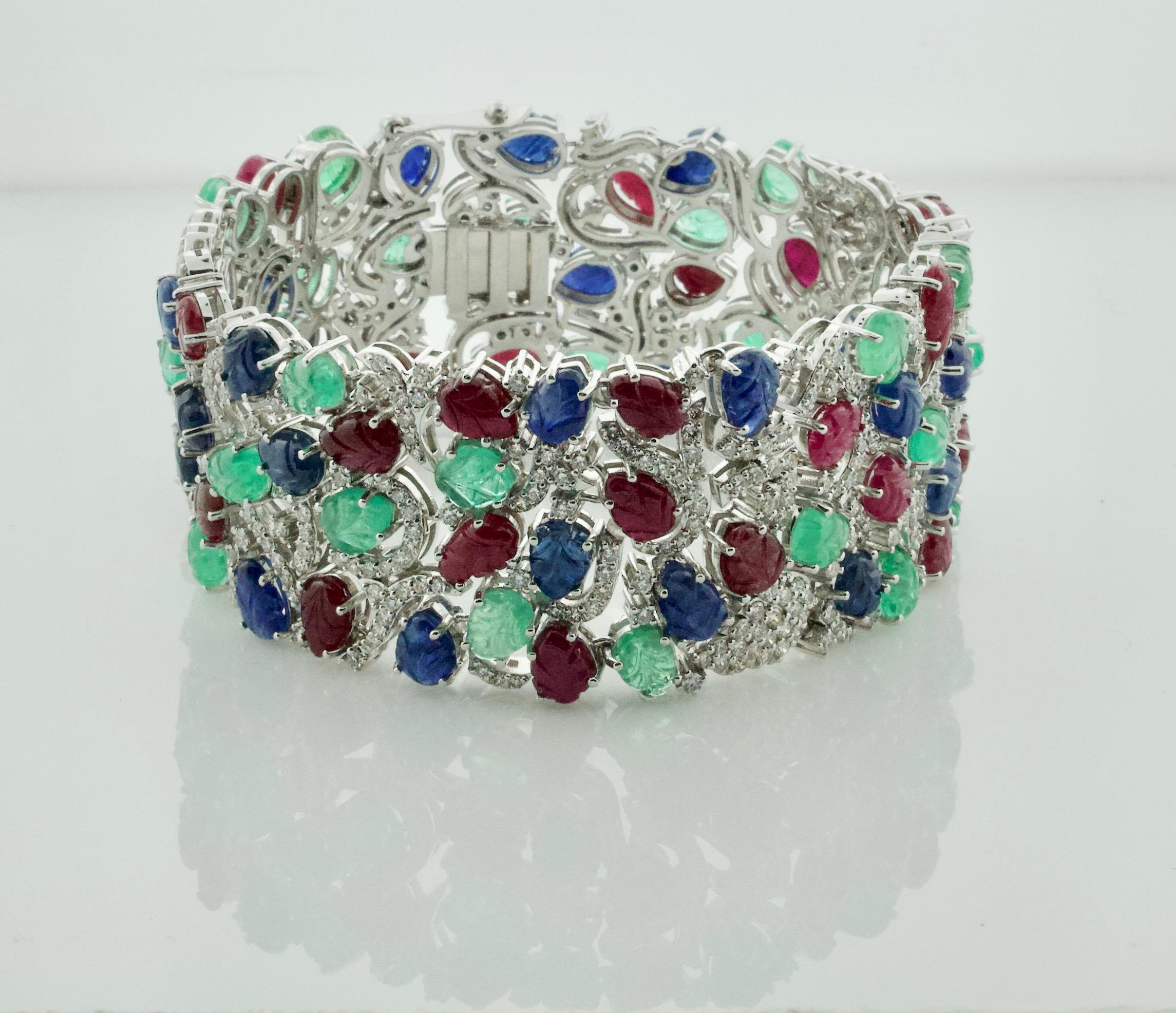 Round Cut Emerald, Ruby and Sapphire Diamond Bracelet 18 Karat Wide For Sale