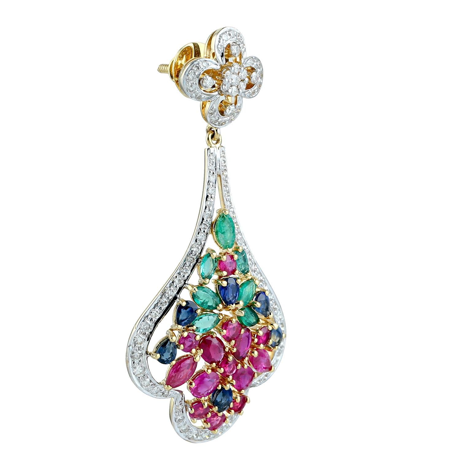 Cast from 18-karat gold.  These beautiful earrings are hand set with 1.35 carats emerald, 4.58 carats ruby, 1.62 carats blue sapphire and 2.11 carats of sparkling diamonds.

FOLLOW  MEGHNA JEWELS storefront to view the latest collection & exclusive