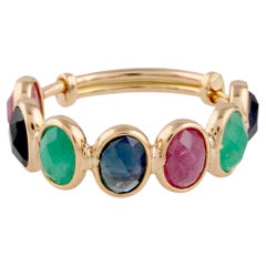 Anillo Oval de Esmeralda, Rubí y Zafiro Azul en Oro Amarillo de 18 K