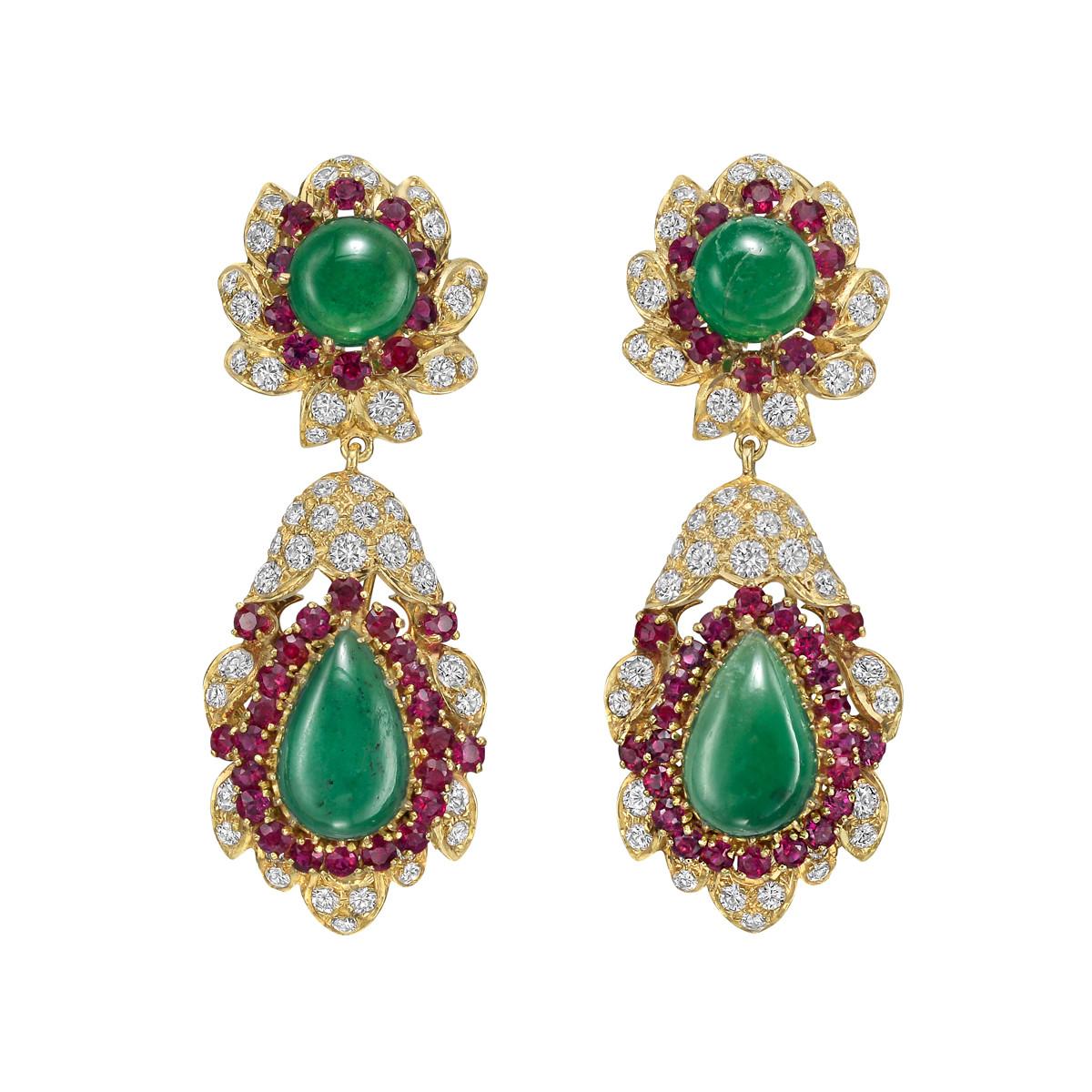 Pendant earrings, designed with a surmount centering a cabochon emerald surrounded by faceted round rubies and diamonds, suspending a drop centering a pear-shaped cabochon jade surrounded by faceted round rubies and diamonds, in 22k yellow