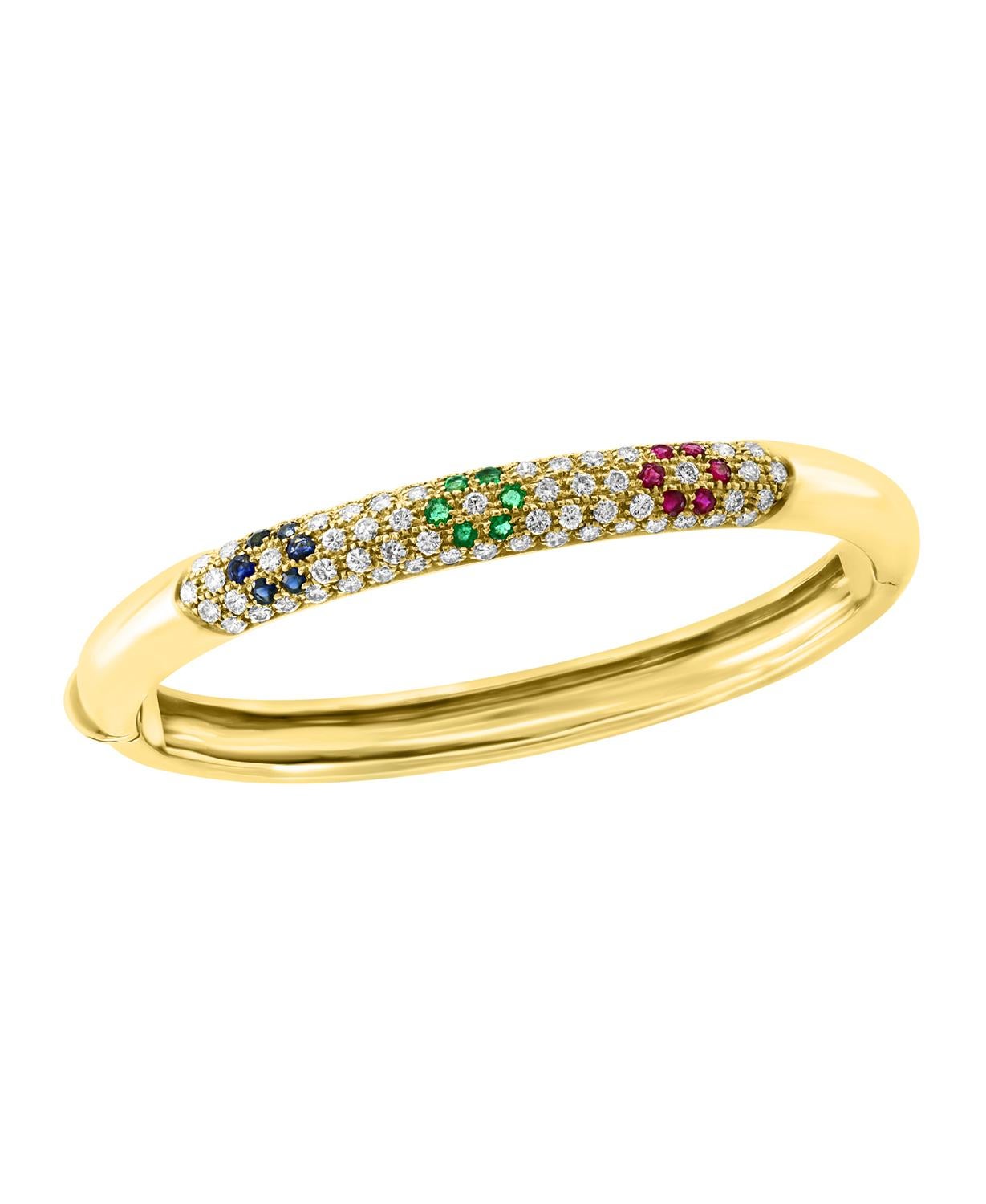  Emerald Ruby Sapphire & Diamond  Cuff  Bangle Bracelet In 18 Karat Yellow Gold 
A spectacular jewelry piece.  This exceptional  and very reasonable in price Bangle bracelet has Three Flowers  one  of each Ruby  Emerald and Sapphire weighing
