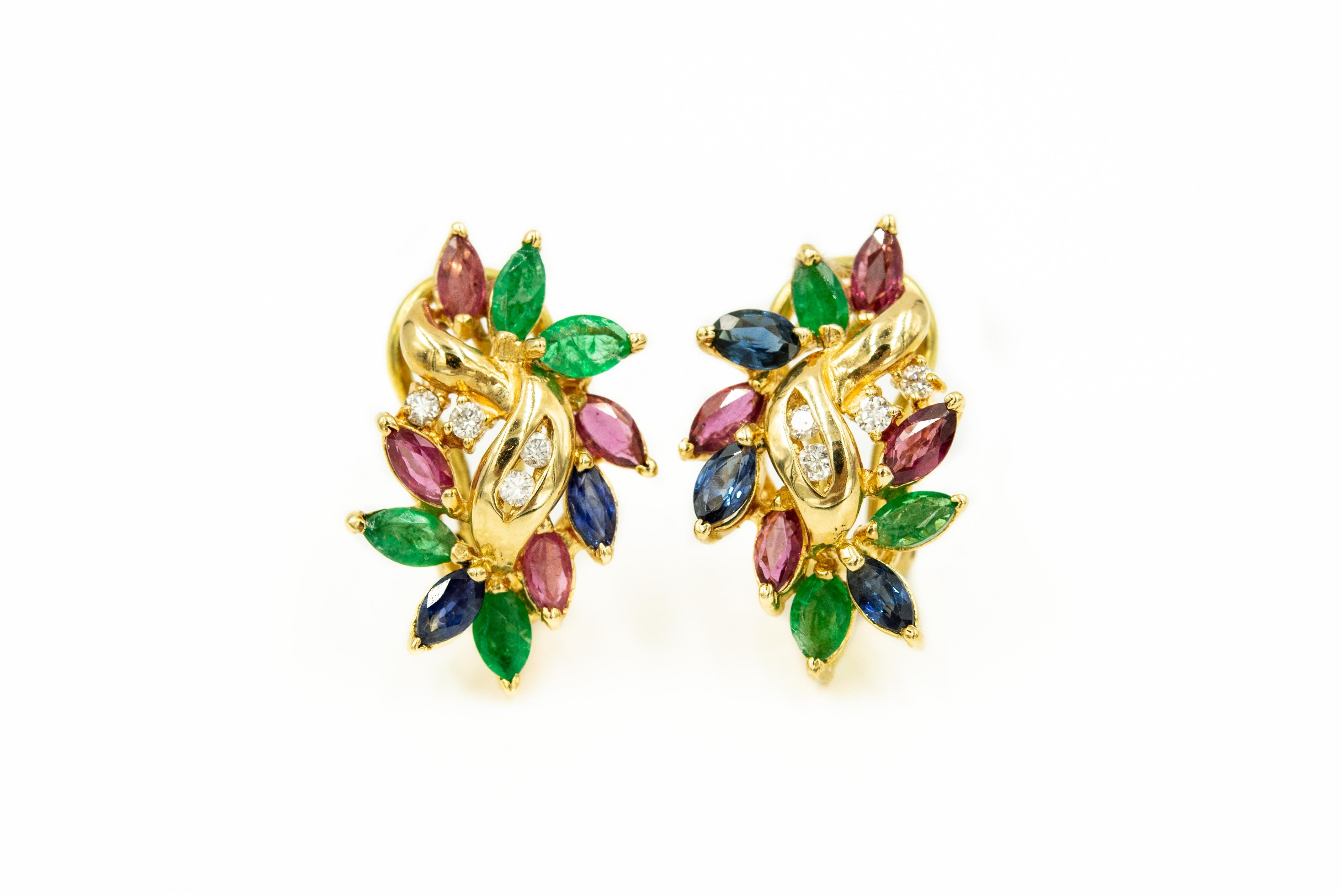 Sapphire, ruby, emerald & diamond earrings, ring and bracelet set includes: 

A pair of 14 yellow gold earrings with marquis rubies, sapphires, emeralds and .16 carats approximate total weight of full cut diamonds.  The earrings have a post and