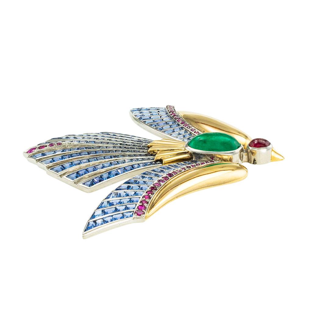  Retro emerald ruby and sapphire platinum and gold Phoenix bird clip brooch circa 1935. *

ABOUT THIS ITEM:  #P-DJ27A. Scroll down for detailed specifications.  This early Retro brooch is a resplendent and rare creature of fantasy.  We love the
