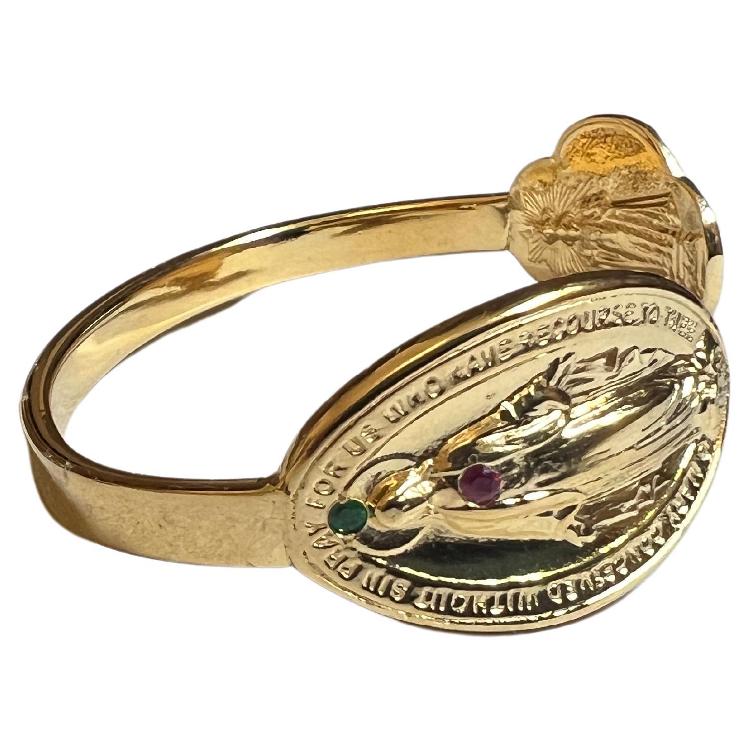 Emerald Ruby Virgin Mary Bangle Bracelet Cuff Gold Plated 
Size Small/Medium

Designer: J Dauphin

Symbols or medals can become a powerful tool in our arsenal for the spiritual. 
Since ancient times spiritual pendants, religious medals has been used