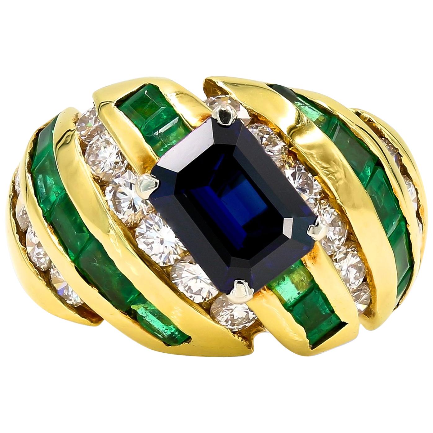 Emerald, Sapphire and Diamond Ring in 18 Karat Yellow Gold