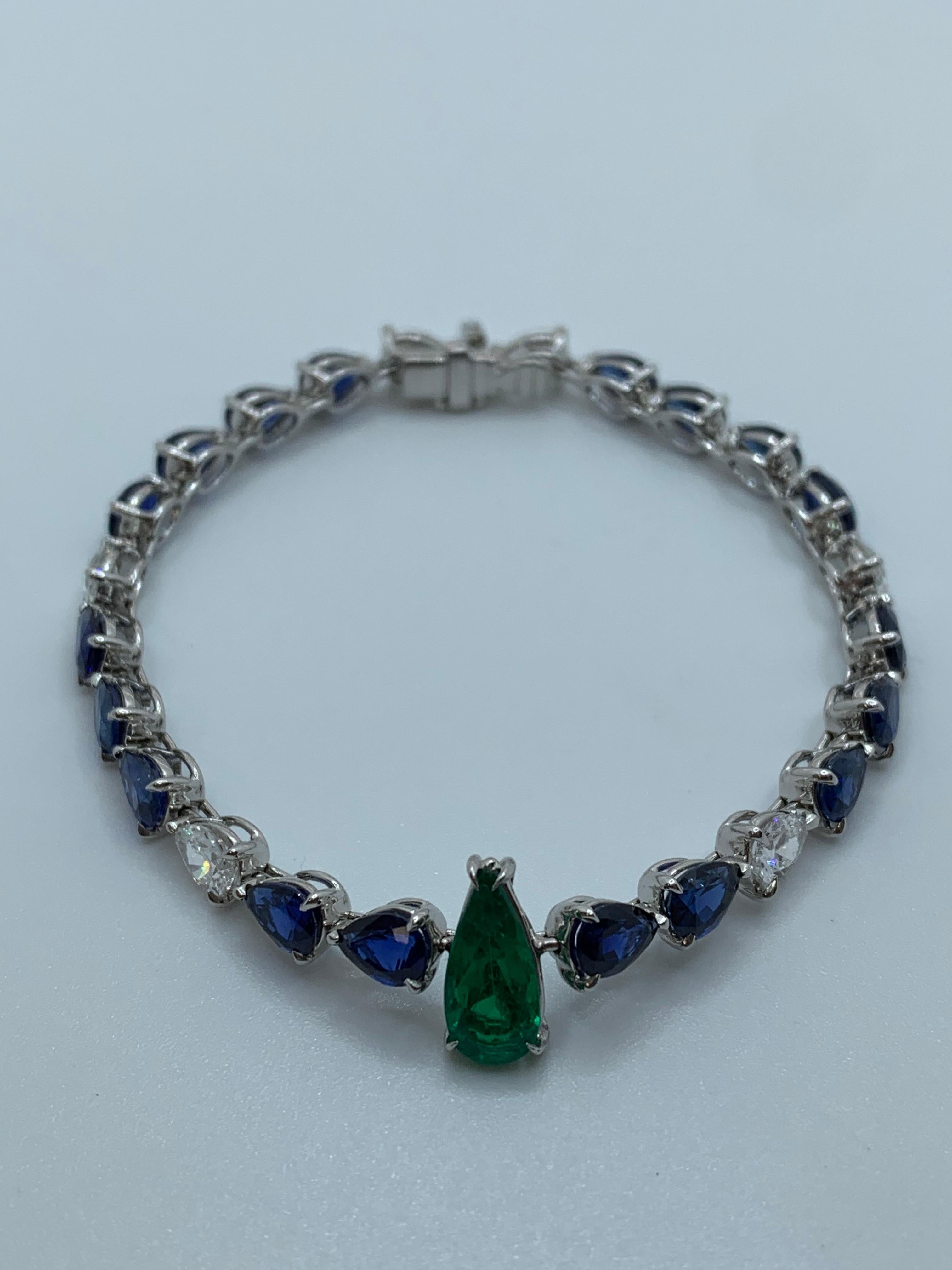 Pear Shaped Emerald, Sapphire and Diamond Necklace. This Bracelet is part of a Suite and can be purchased individually.

Striking Bracelet and color combination. The gorgeous Colombian Emeralds matched with the beautiful Ceylon Sapphires play as if