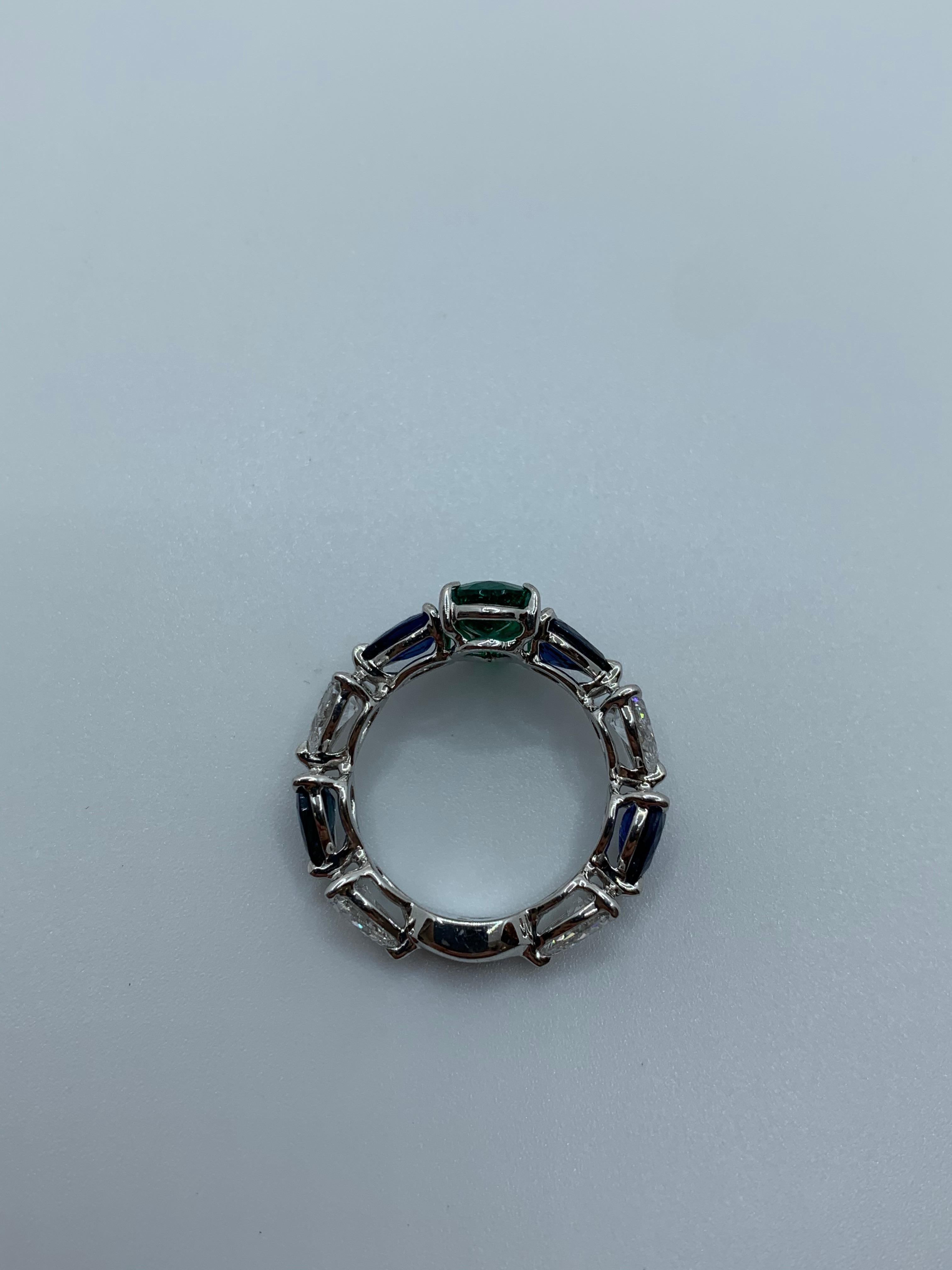 Pear Shaped Emerald, Sapphire and Diamond Ring. This Ring is part of a Suite and can be purchased individually.

Striking Ring and color combination. The gorgeous Colombian Emerald matched with the beautiful Ceylon Sapphires play as if they are one
