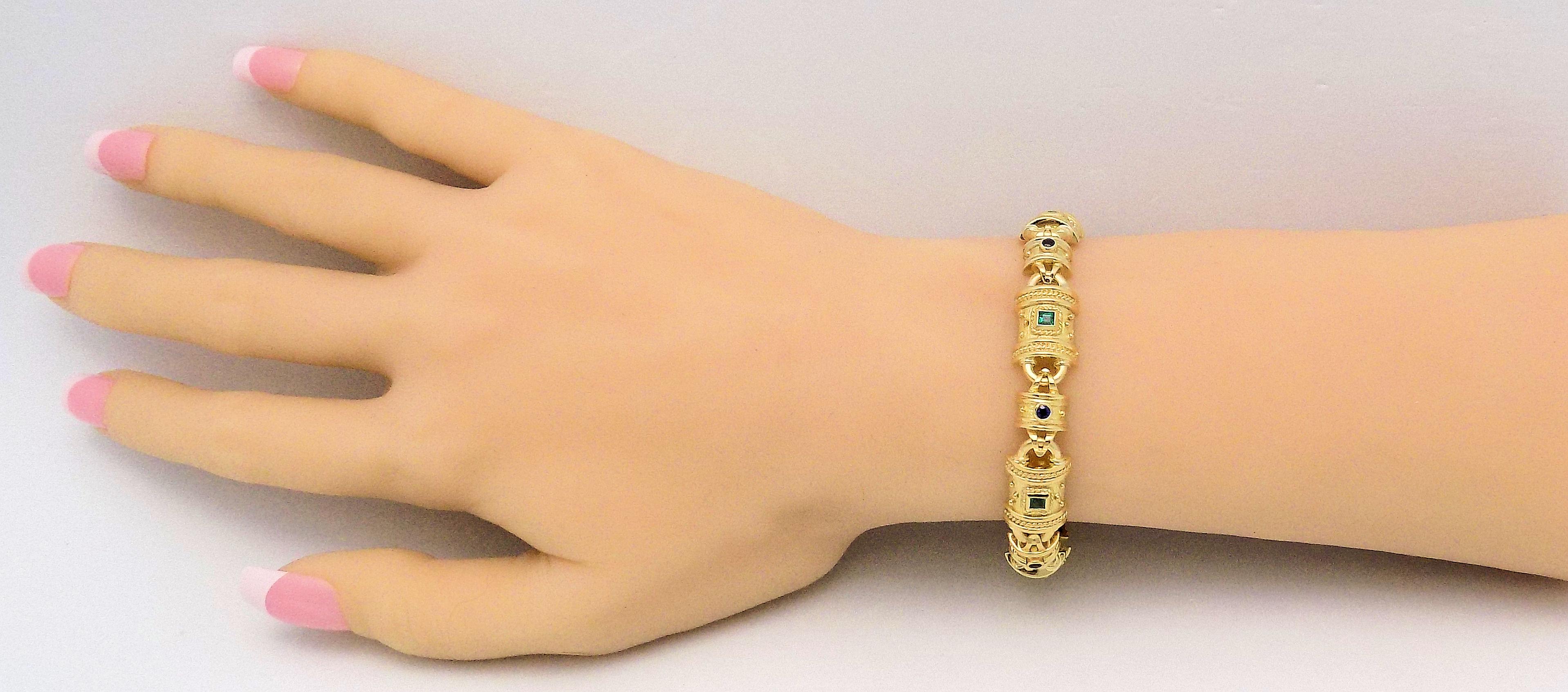 18 Karat Yellow Gold Bracelet with Bead and Twist Detail featuring 6 Square Cut Emeralds 3 X 3 MM, 6 Round Cut Sapphires 2.5 MM, 7