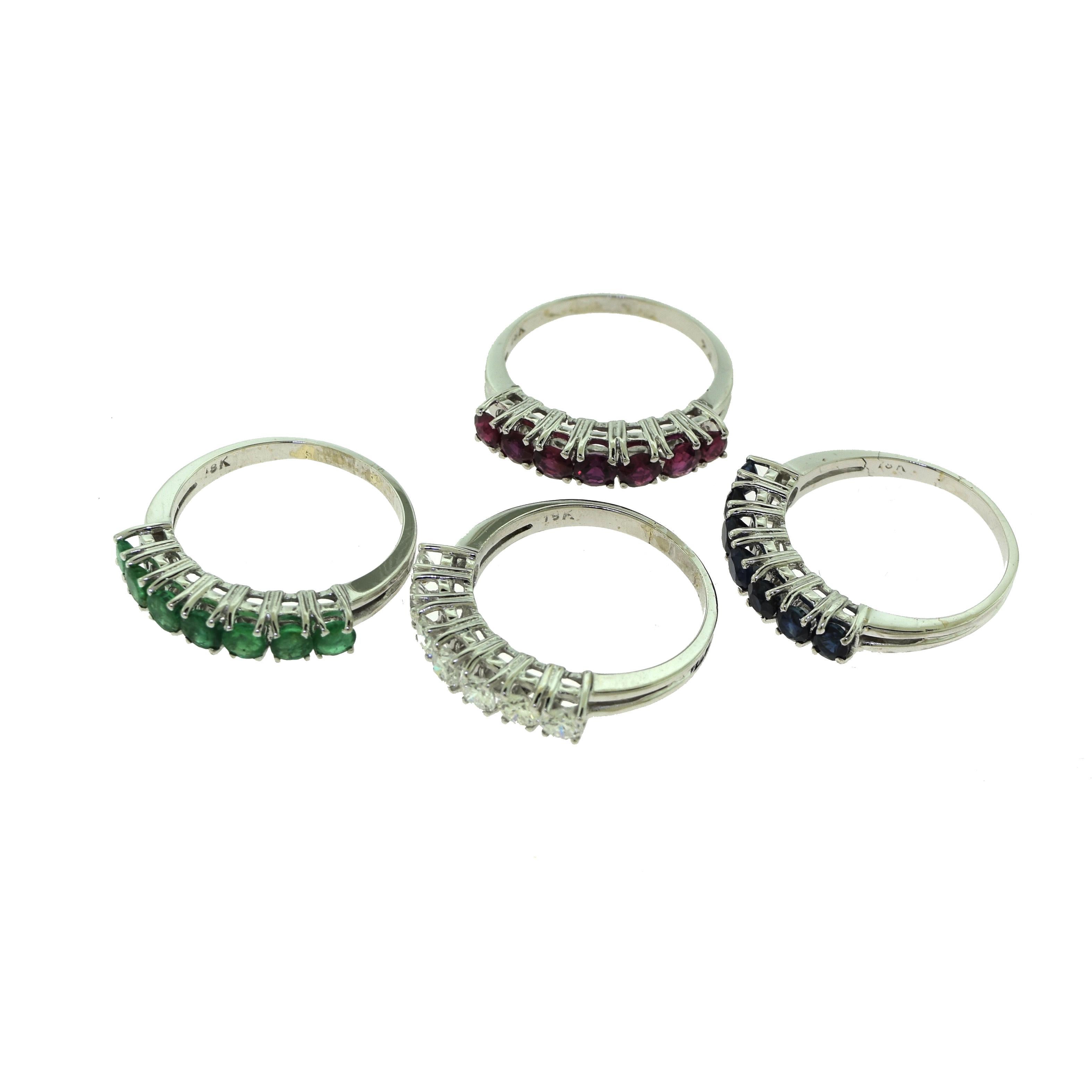 Emerald, Sapphire, Diamond, Ruby Stackable 4-Piece Ring Set In Good Condition In Miami, FL