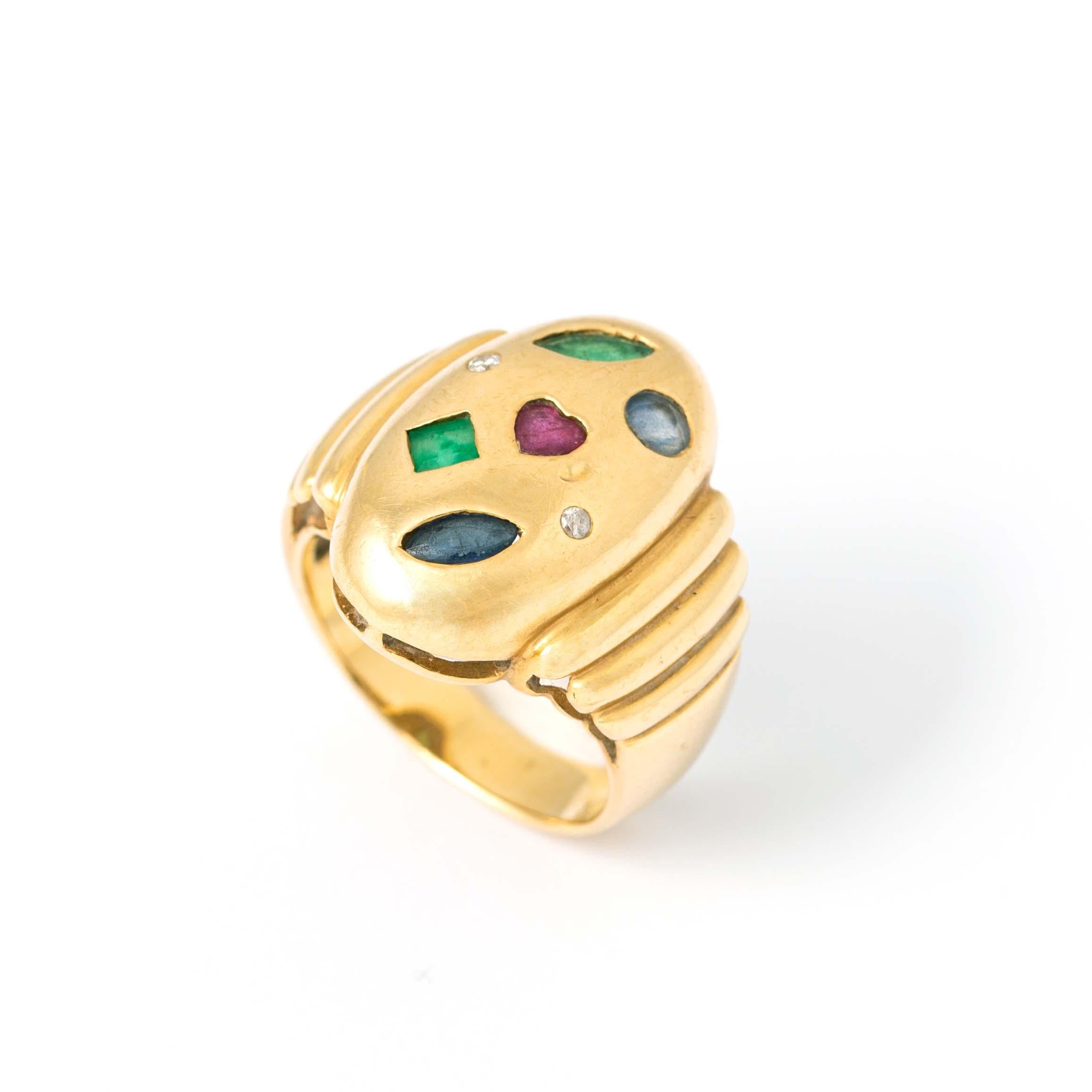 Emerald, Sapphire, Ruby and Diamond fancy cuts on Yellow Gold 18K Ring
Unreadable hallmark. Circa 1960.
Top pattern dimensions: 20.74 mm. x 12.70 mm. x 6.40 mm.
Gross weight: 9.16 grams.