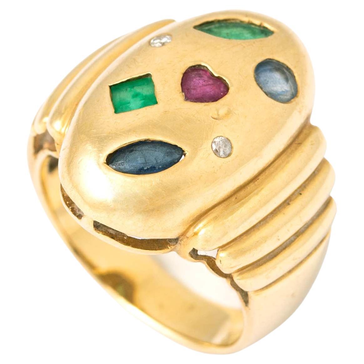 Bague en or jaune 18 carats avec émeraude, saphir, rubis et diamant en vente