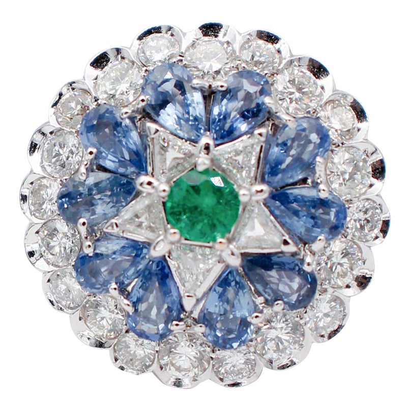 Émeraude, saphirs, diamants, bague en or blanc 14 carats