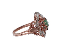 Emerald, Sapphires, Diamonds, Rose Gold and Silver Ring.